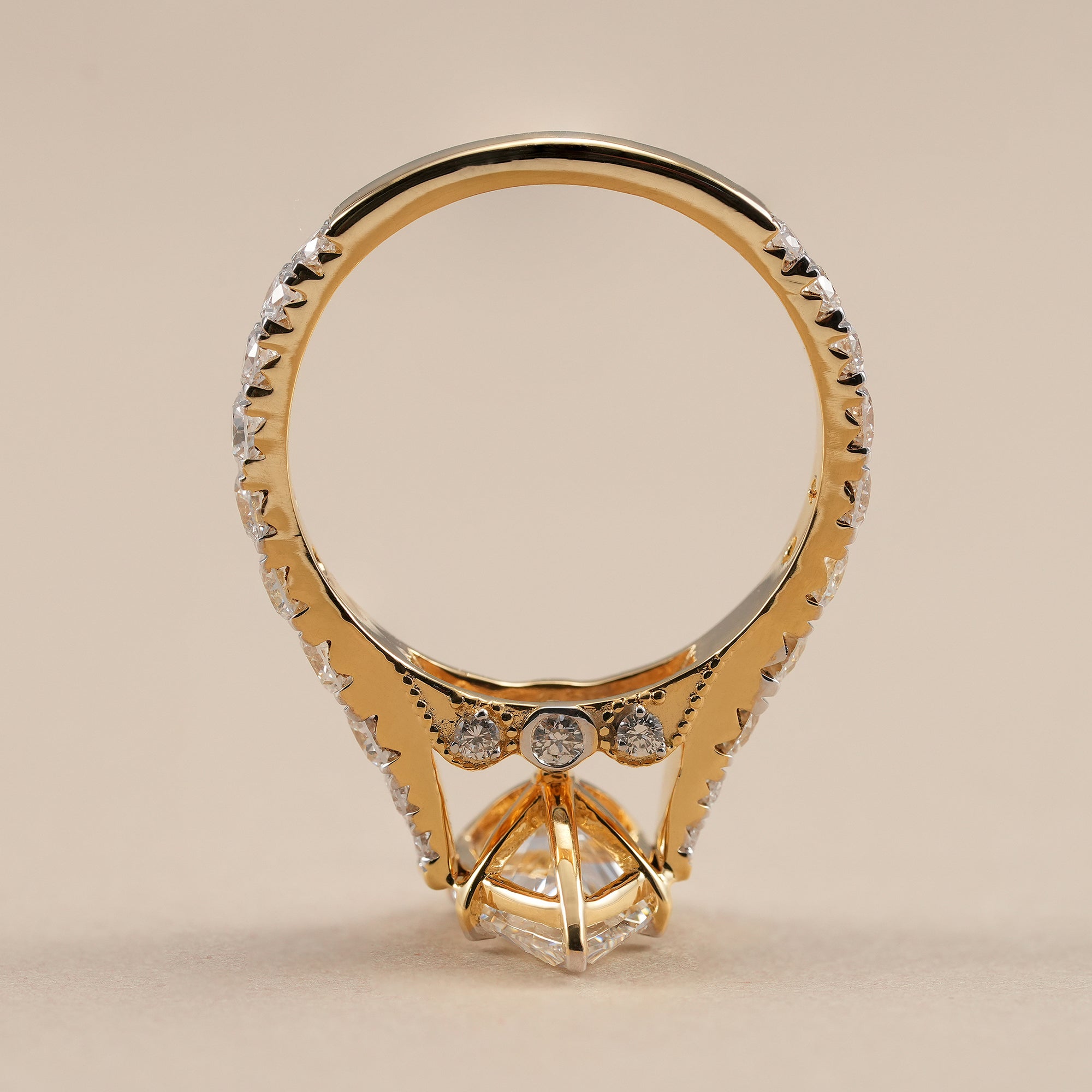 Luxury pear diamond proposal ring with cathedral setting