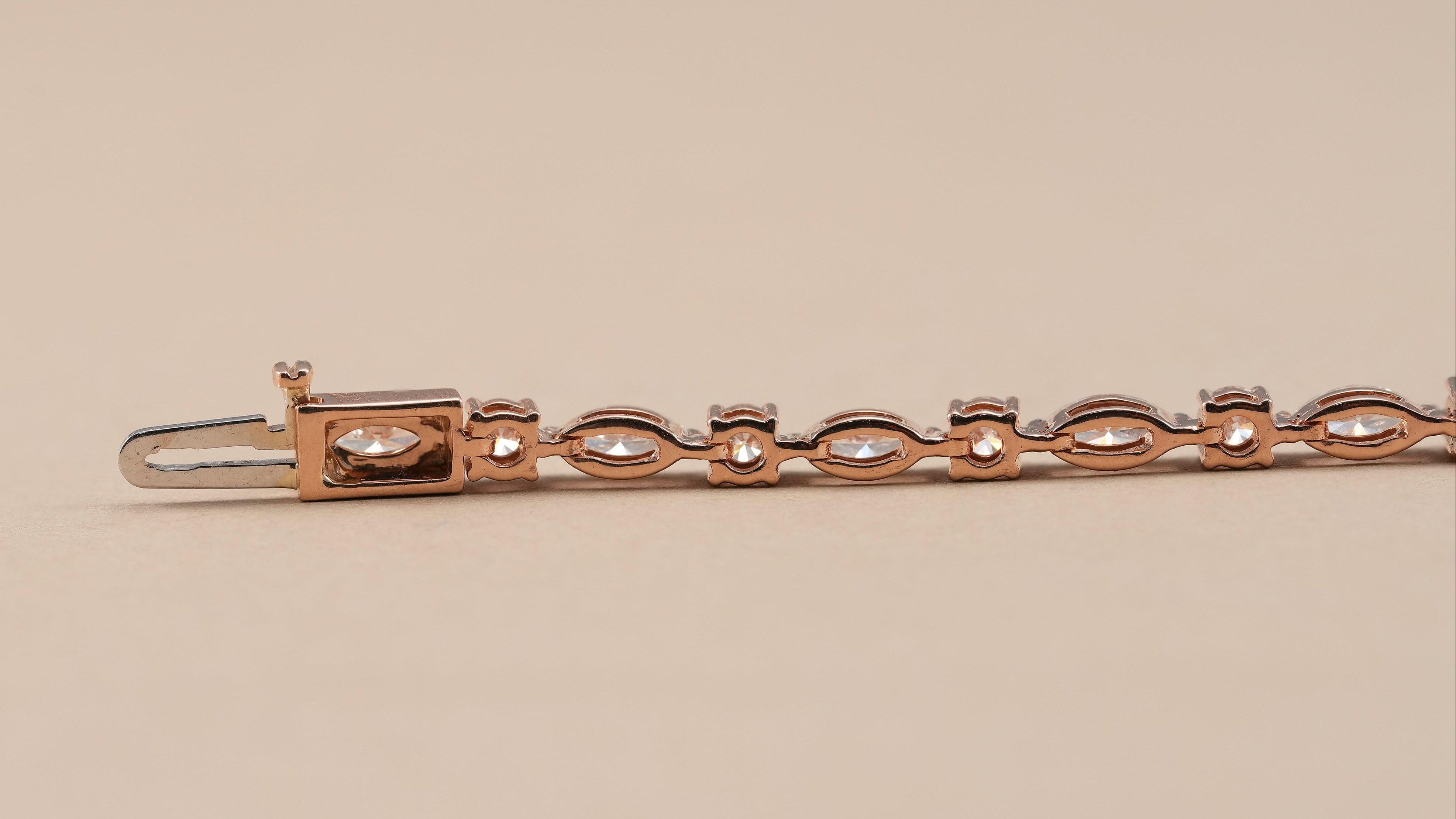 Women's elegant diamond tennis bracelet with marquise diamond accents