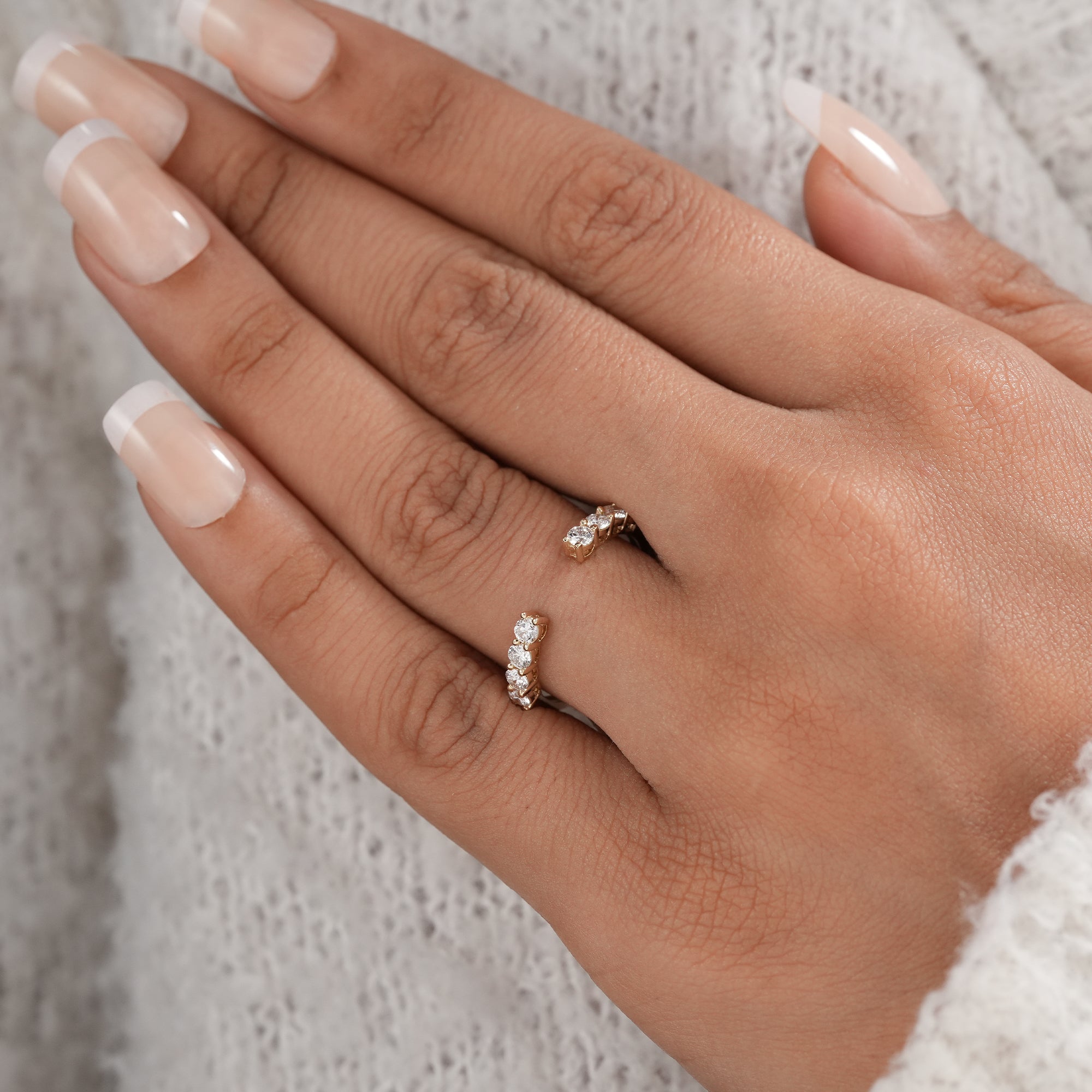 Minimalist open wedding band with round lab diamonds