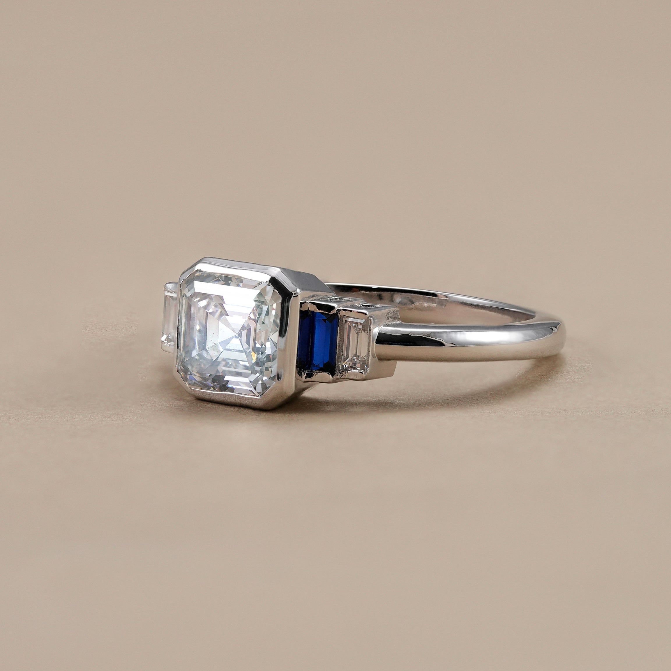 IGI certified square emerald lab diamond ring in white gold.