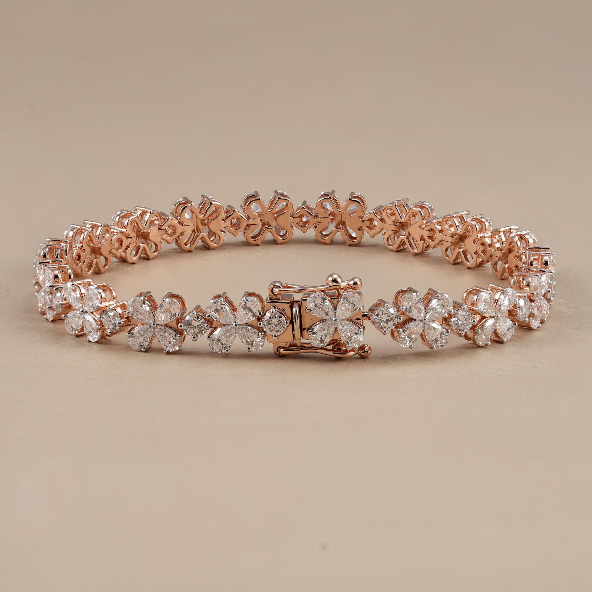Lab grown pear diamond bracelet with flower inspired design