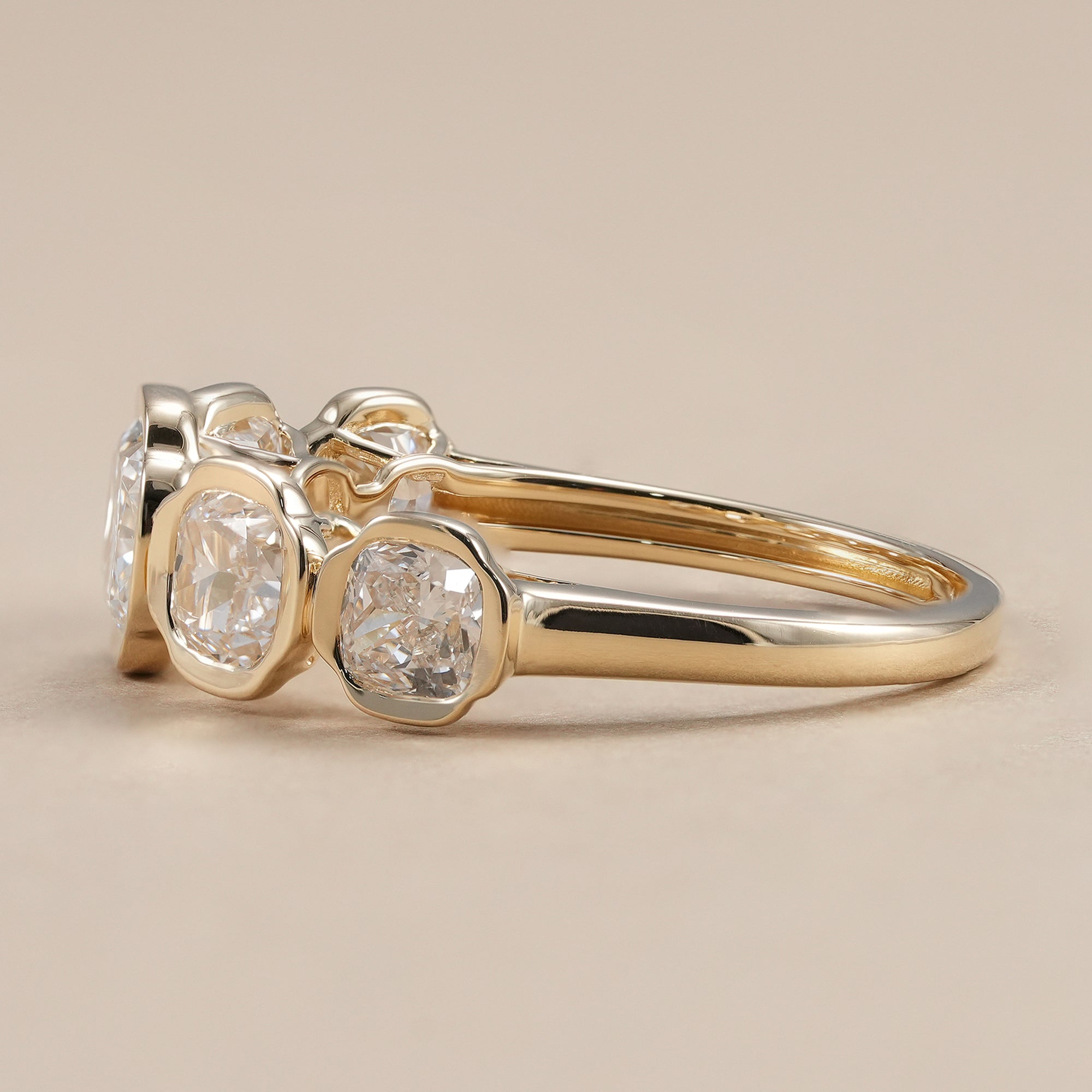 Cushion cut lab diamond five stone wedding band for women.
