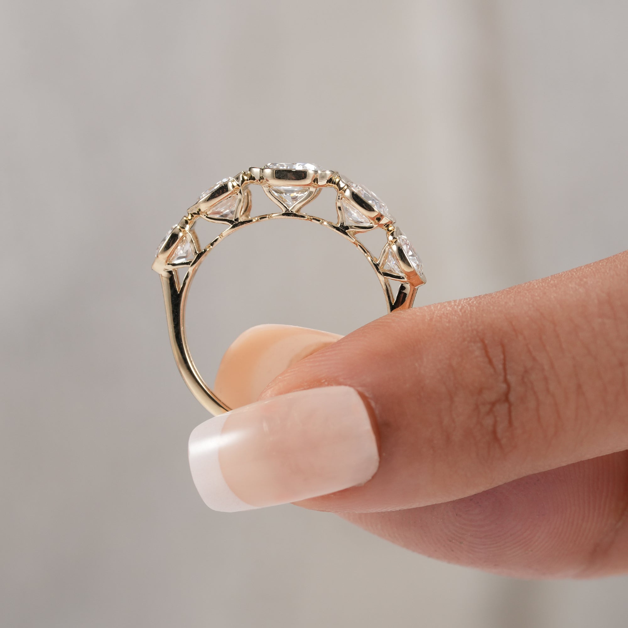 Luxury five stone lab grown diamond band for wedding and anniversary.