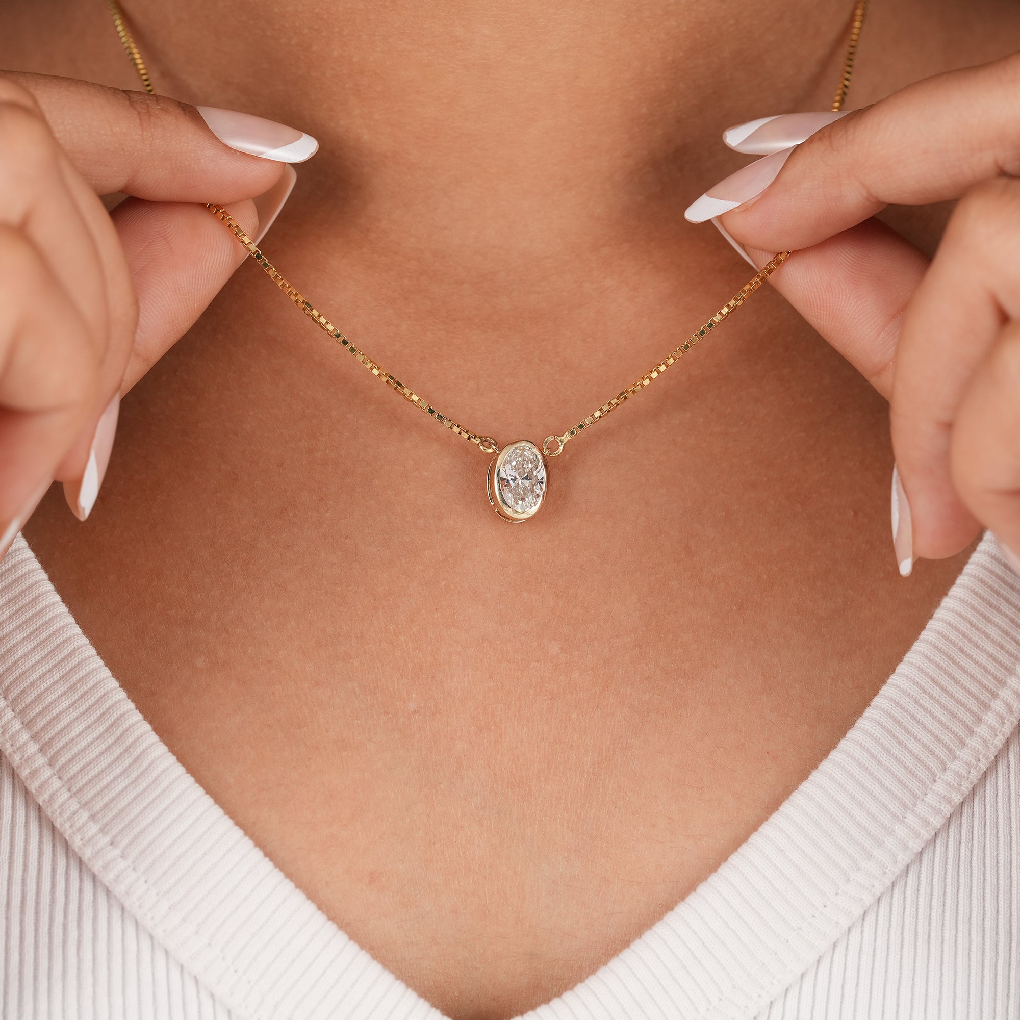 Oval cut lab diamond pendant necklace with gold chain