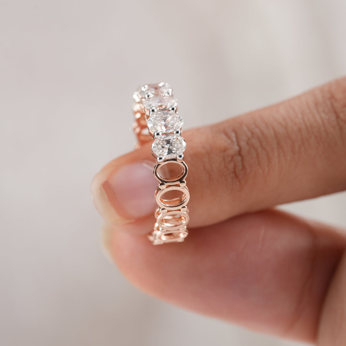 Oval diamond ring with full eternity design.