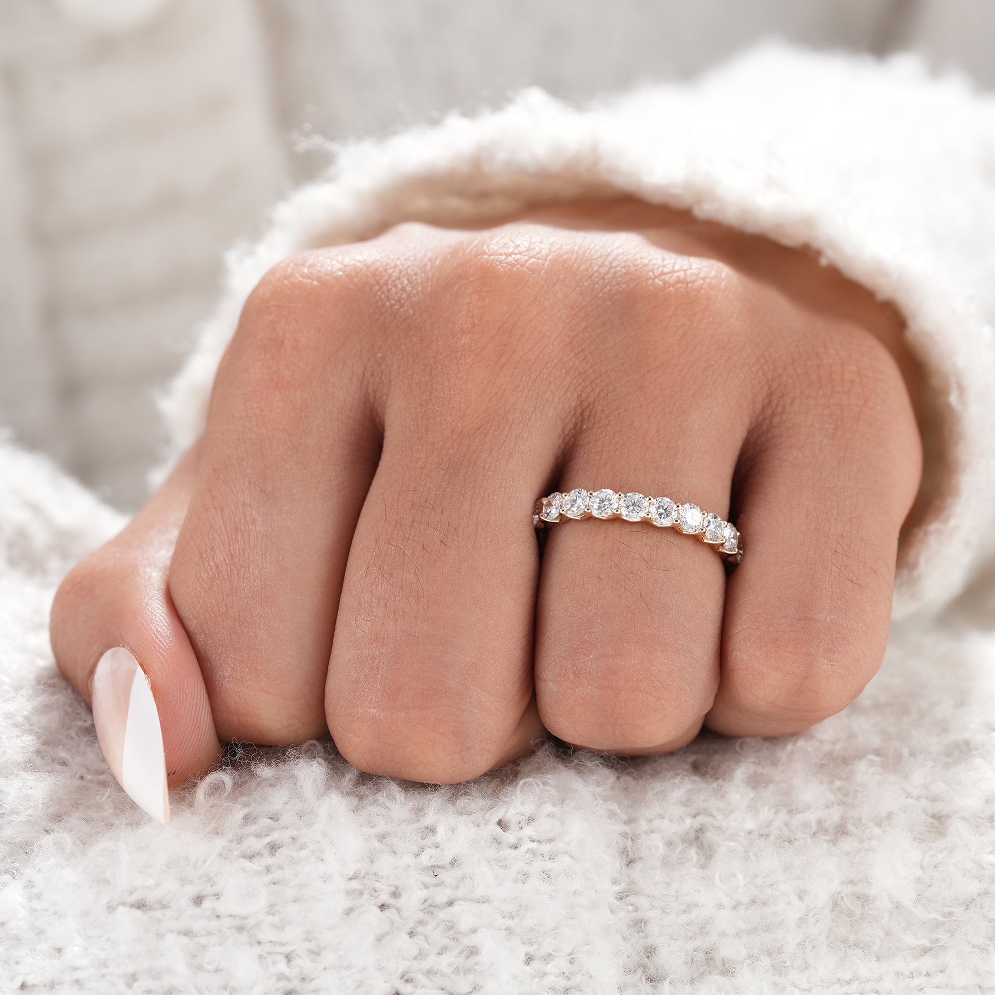 Shared prong lab grown diamond wedding band.