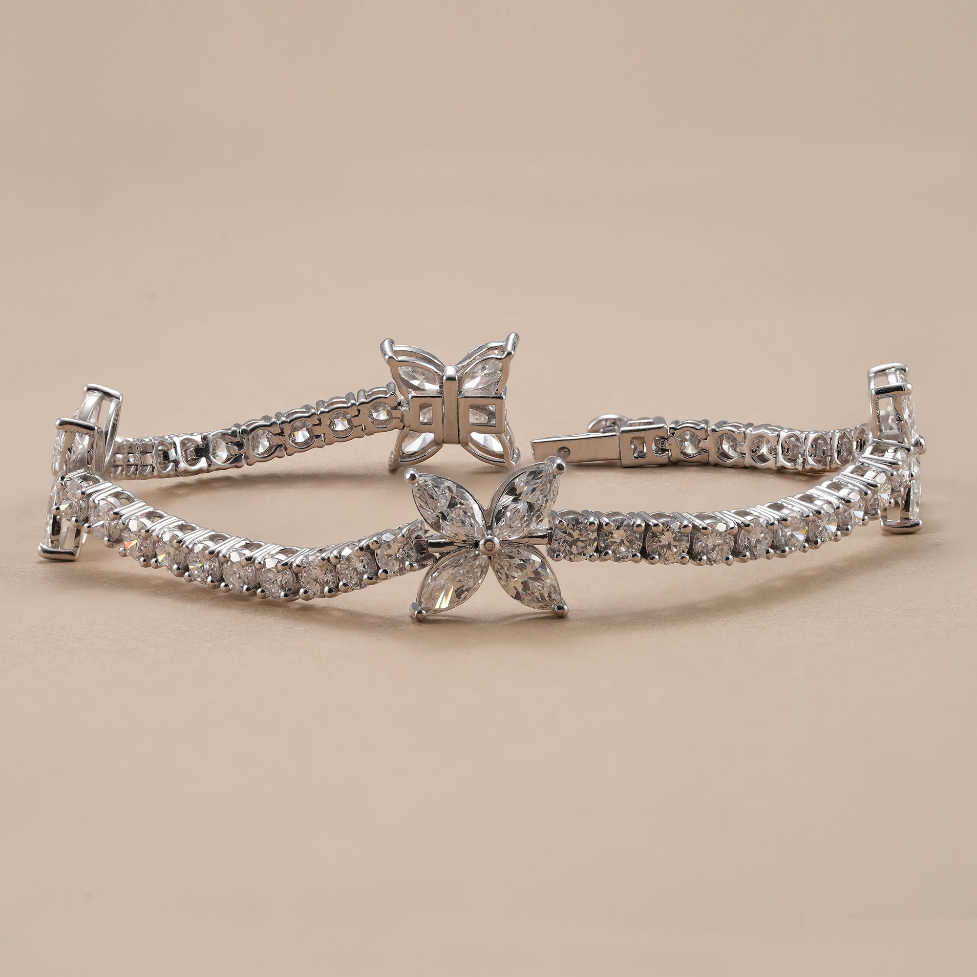 Bridal lab grown diamond bracelet with butterfly motifs.