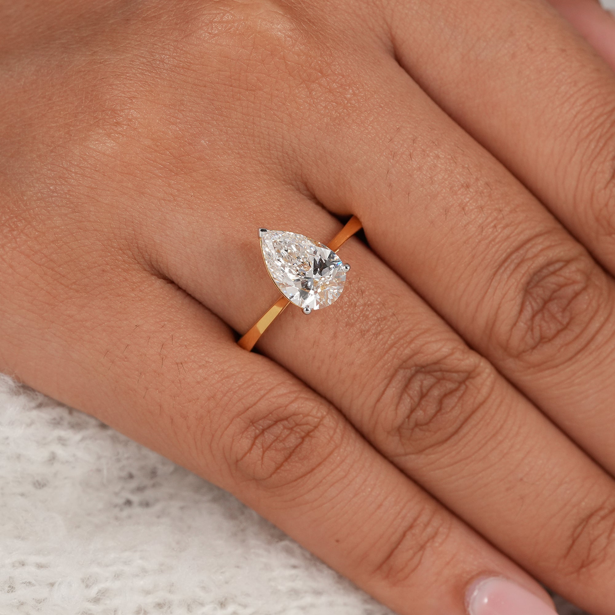 Luxury pear cut solitaire ring with lab grown diamond