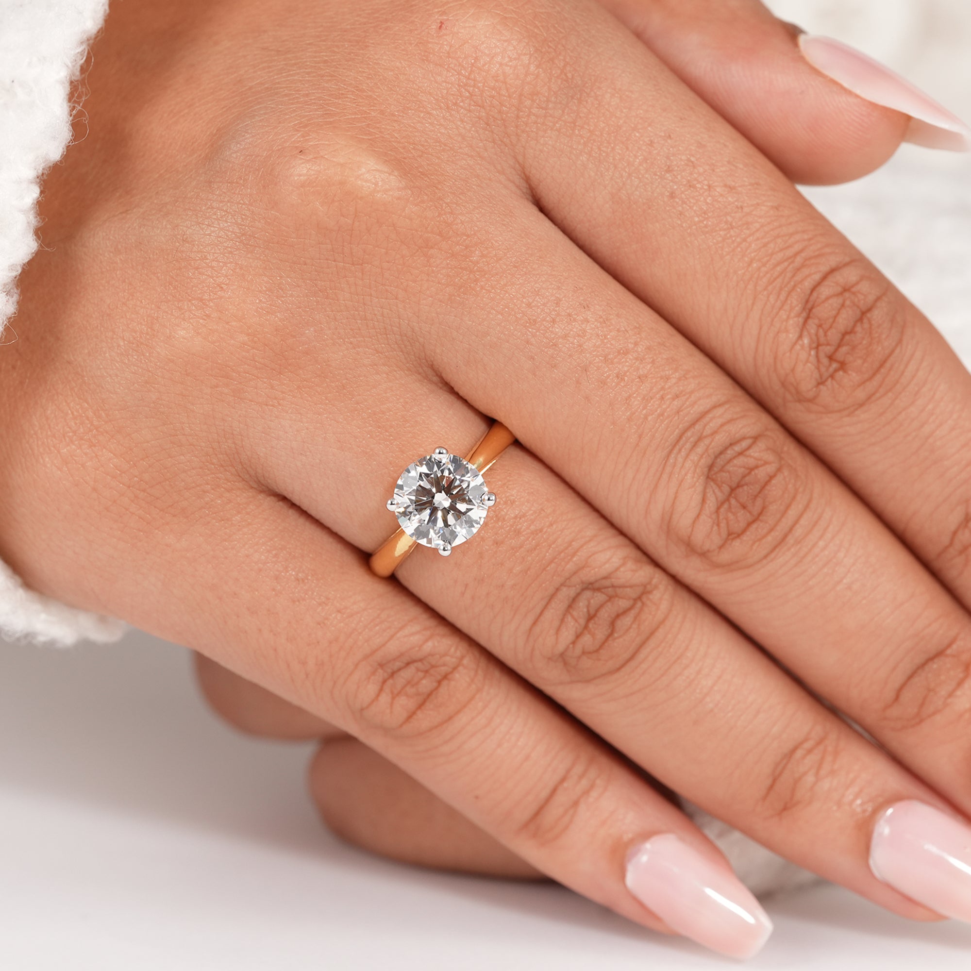 Luxury round lab grown diamond engagement ring with four prong setting