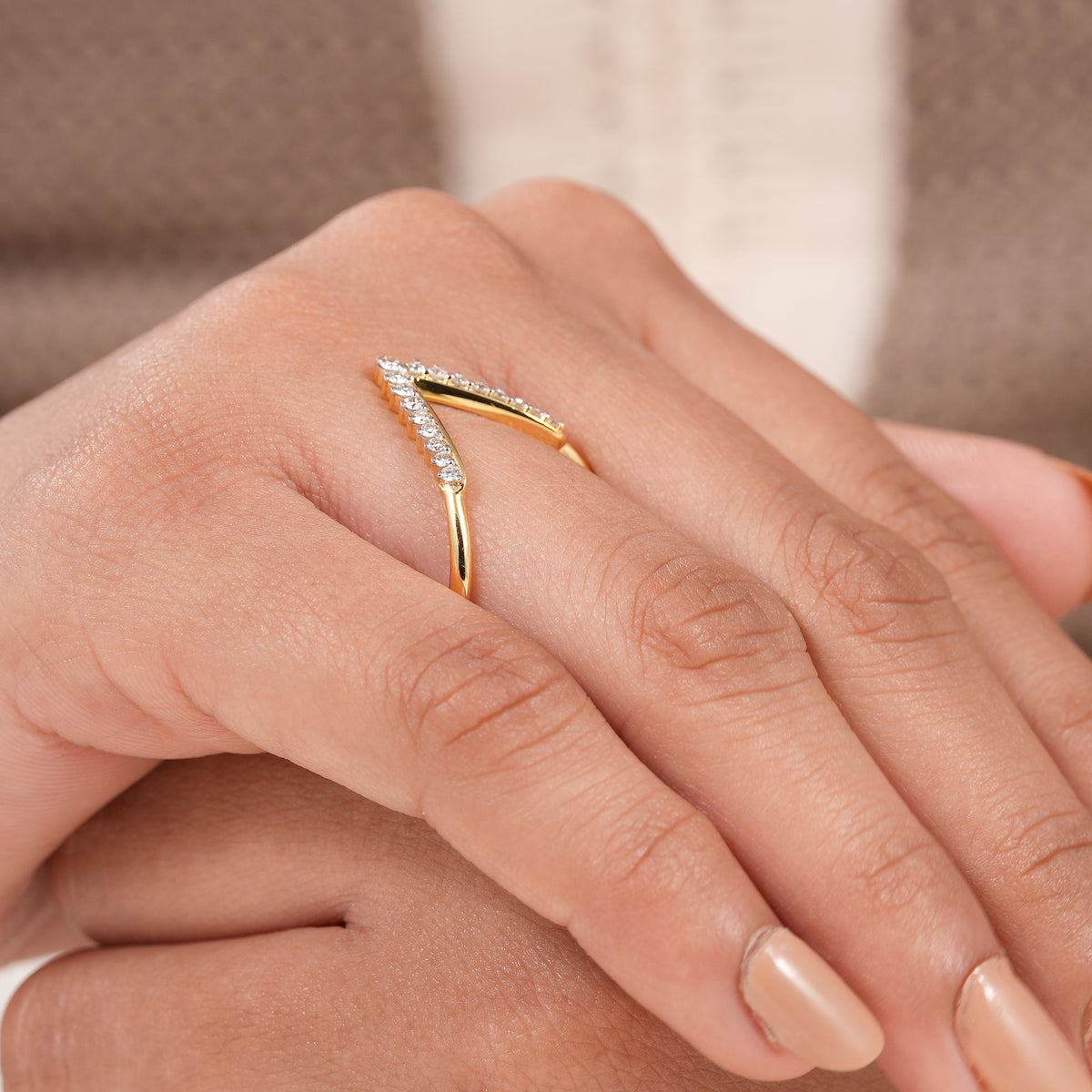 Curved anniversary band featuring ethically created lab diamonds in polished yellow gold.