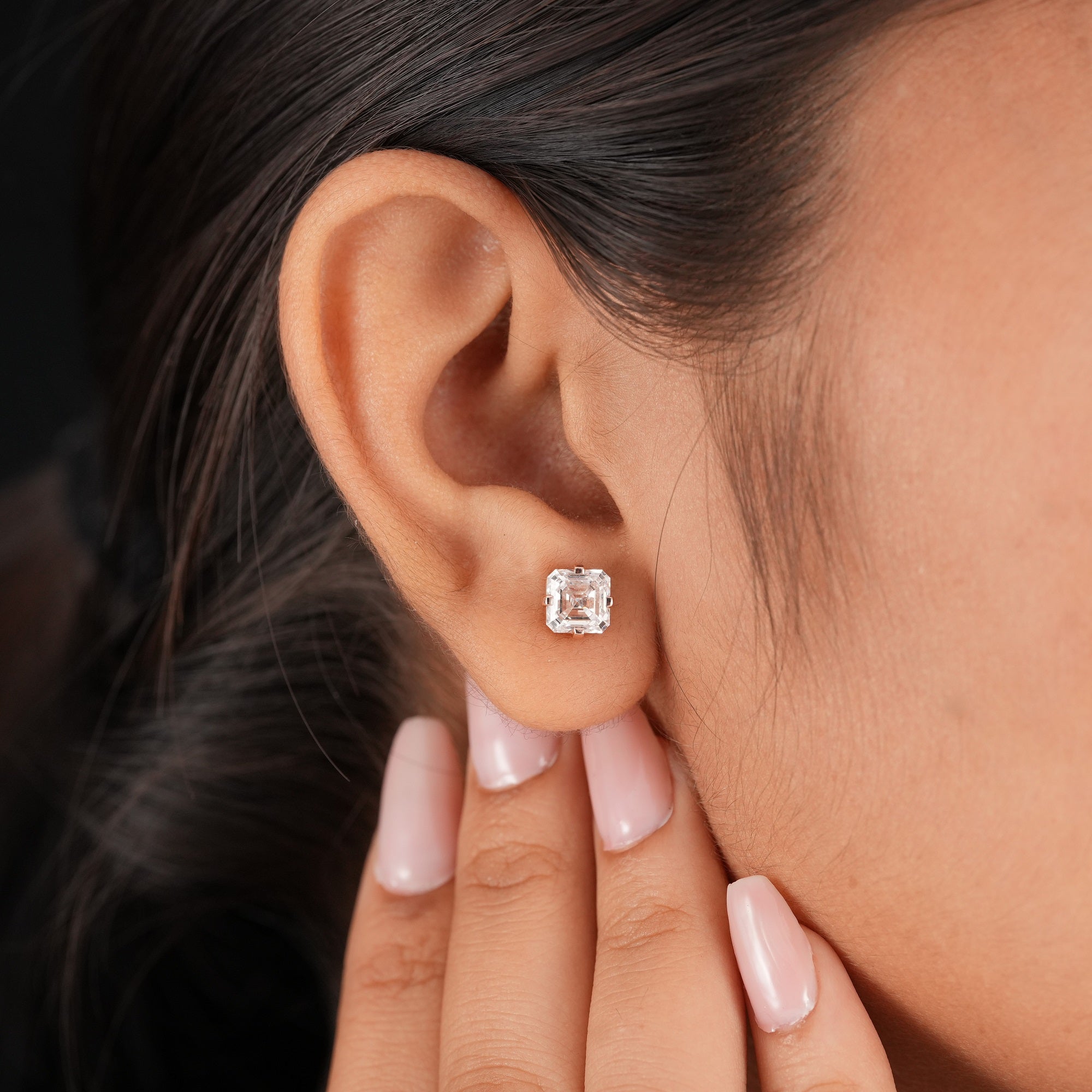 Fine jewelry Asscher diamond stud earrings handcrafted with ethical lab grown diamonds.