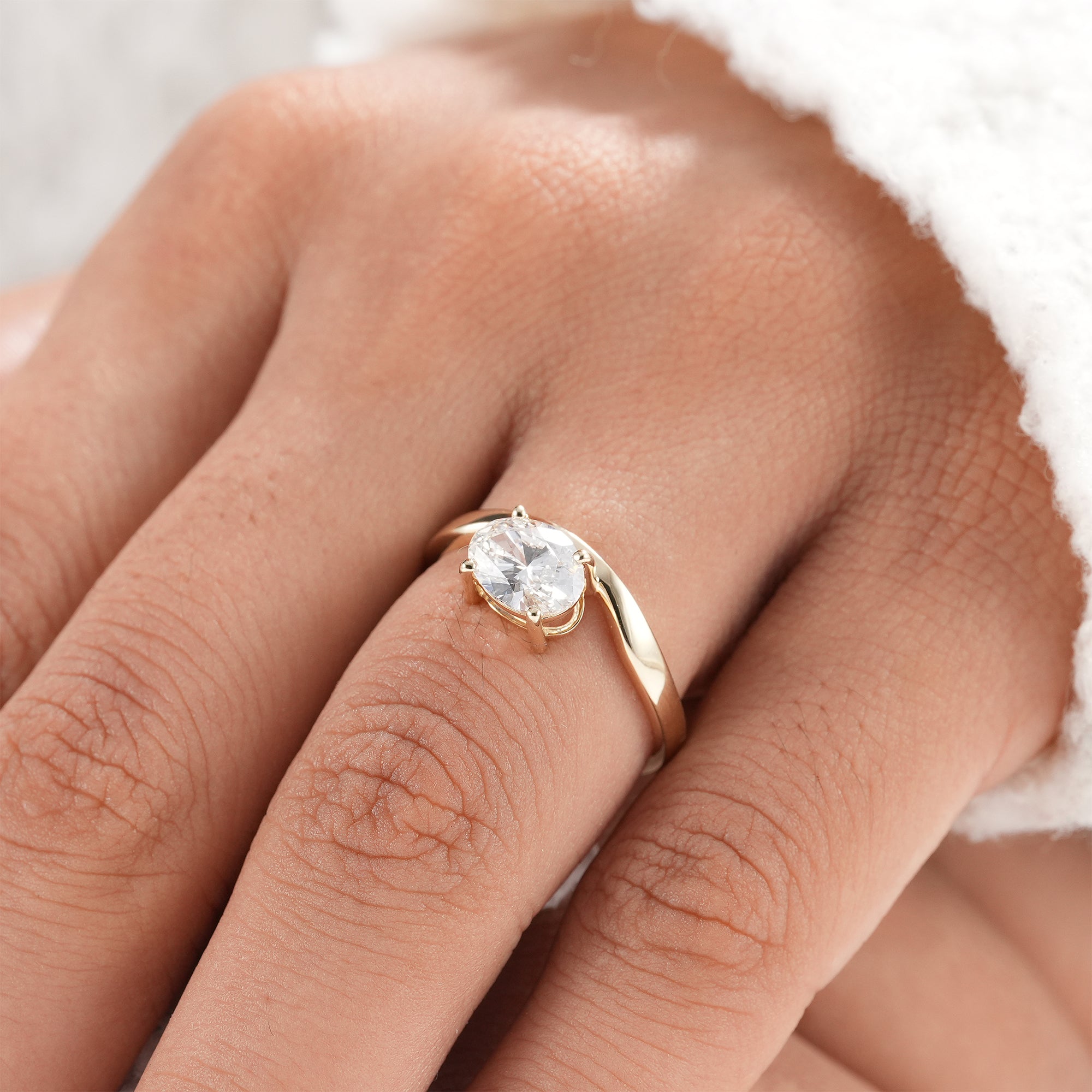 Timeless oval solitaire engagement ring for brides.