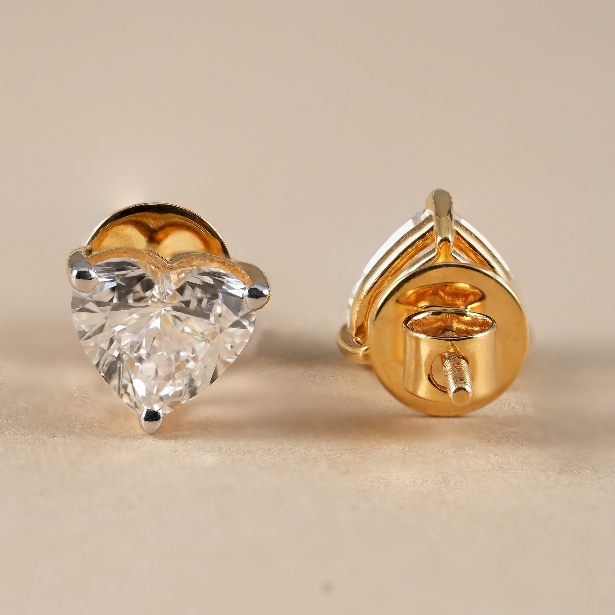 Heart cut solitaire diamond stud earrings