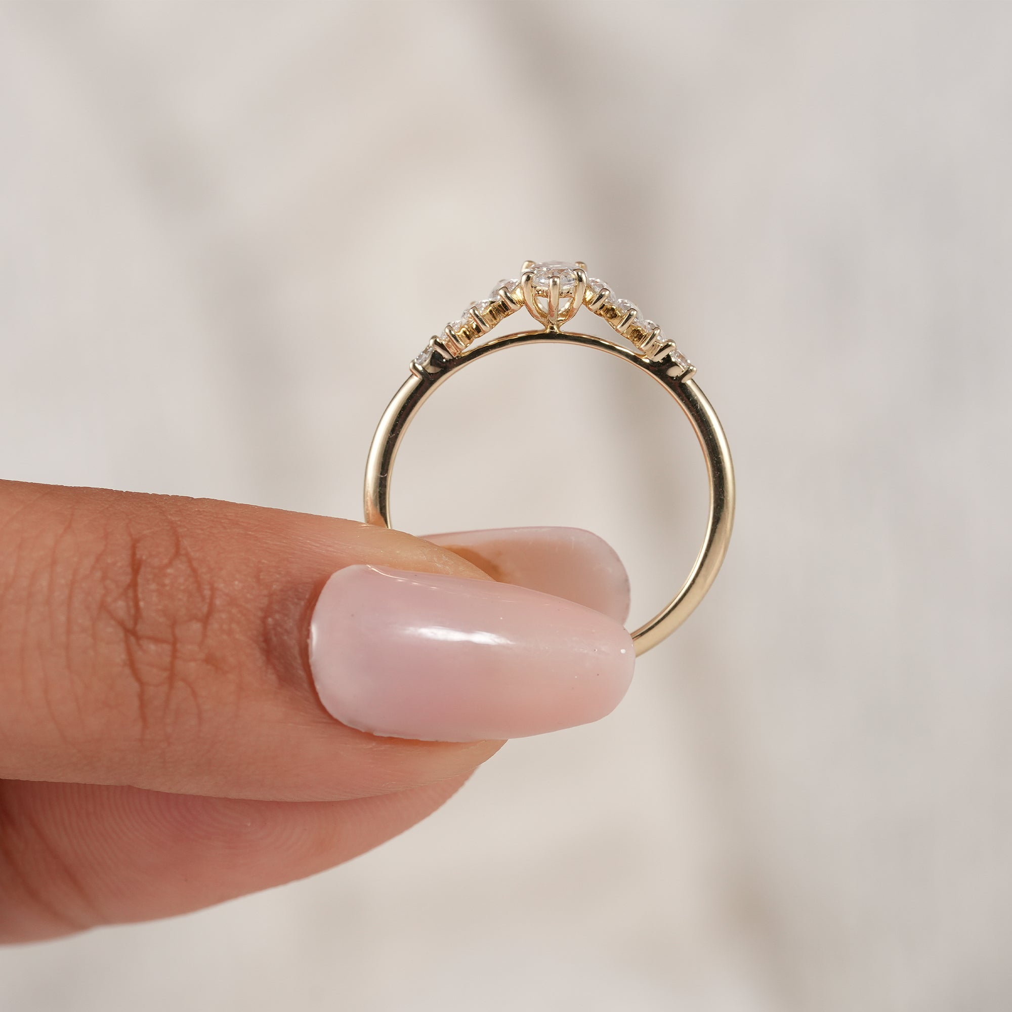 Elegant bridal ring featuring lab grown marquise diamonds.