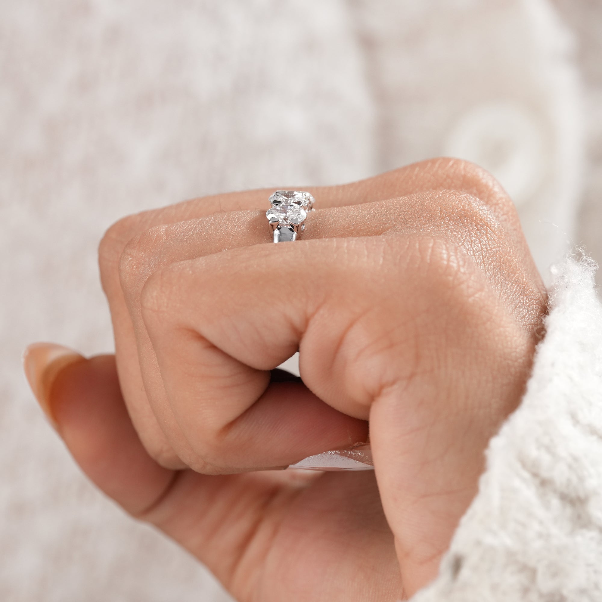 Elegant oval diamond band for bridal jewelry collection.