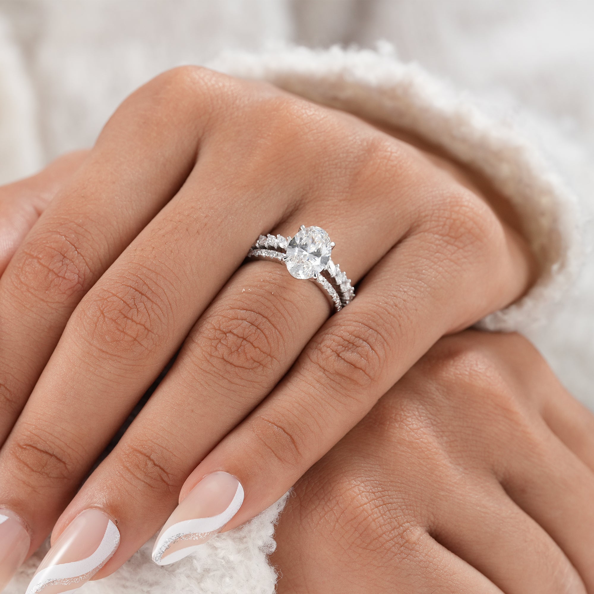 Oval lab grown diamond bridal wedding set with stackable marquise band.