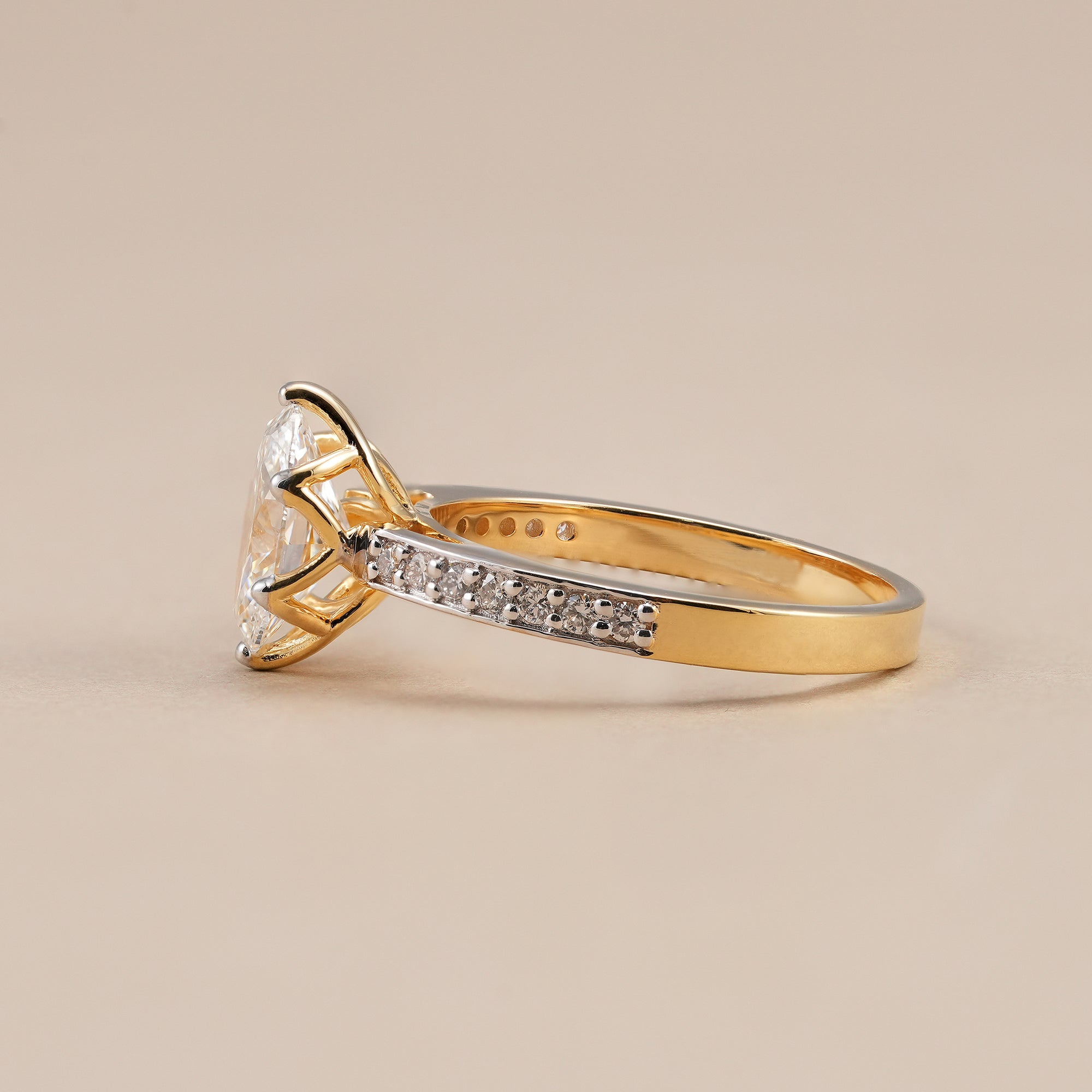 Fine jewelry oval solitaire engagement ring with pavé diamonds