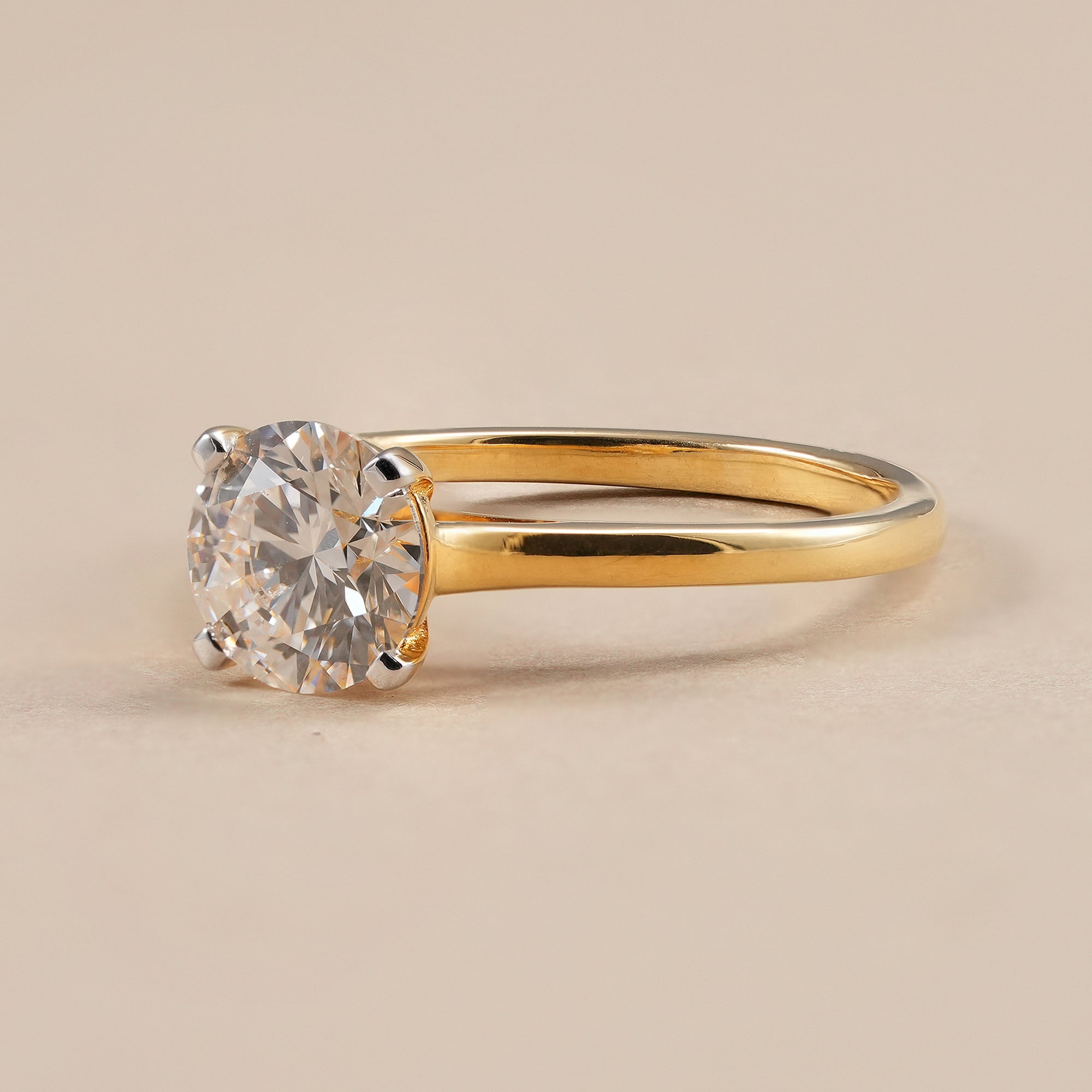 Classic round lab grown diamond engagement ring with elegant cathedral setting