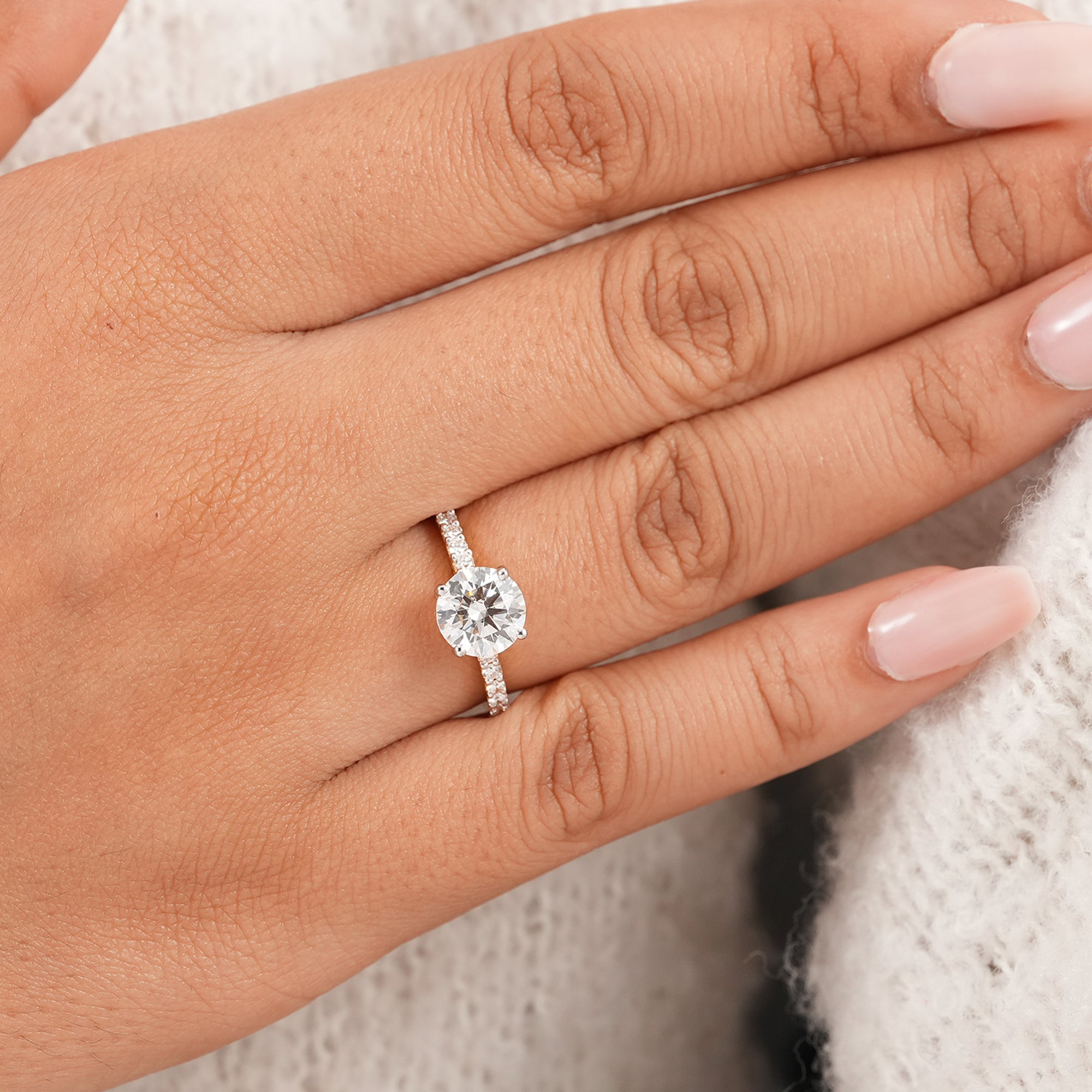 Minimalist round solitaire diamond ring in yellow gold