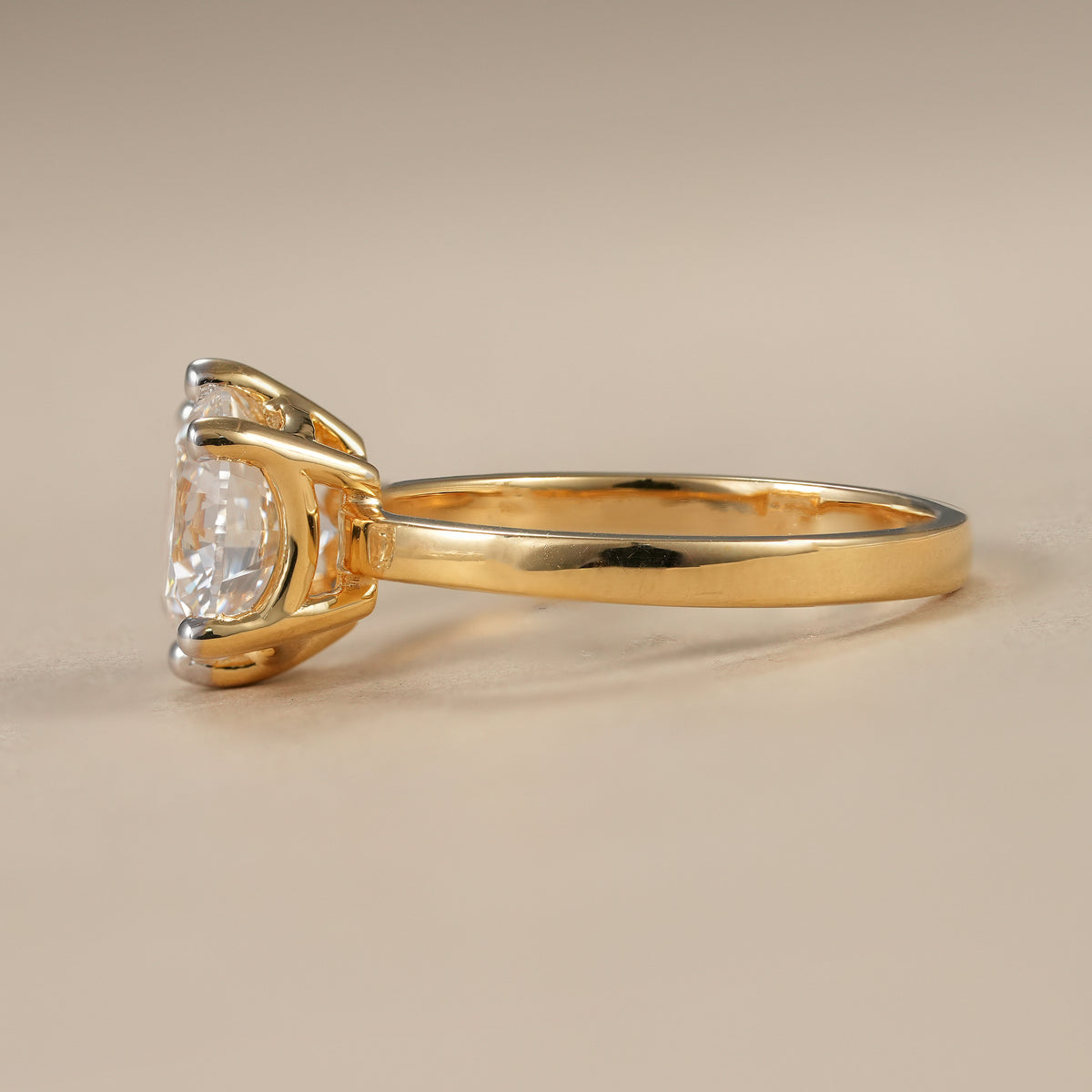 Classic round lab diamond engagement ring with secure six prong solitaire mounting.