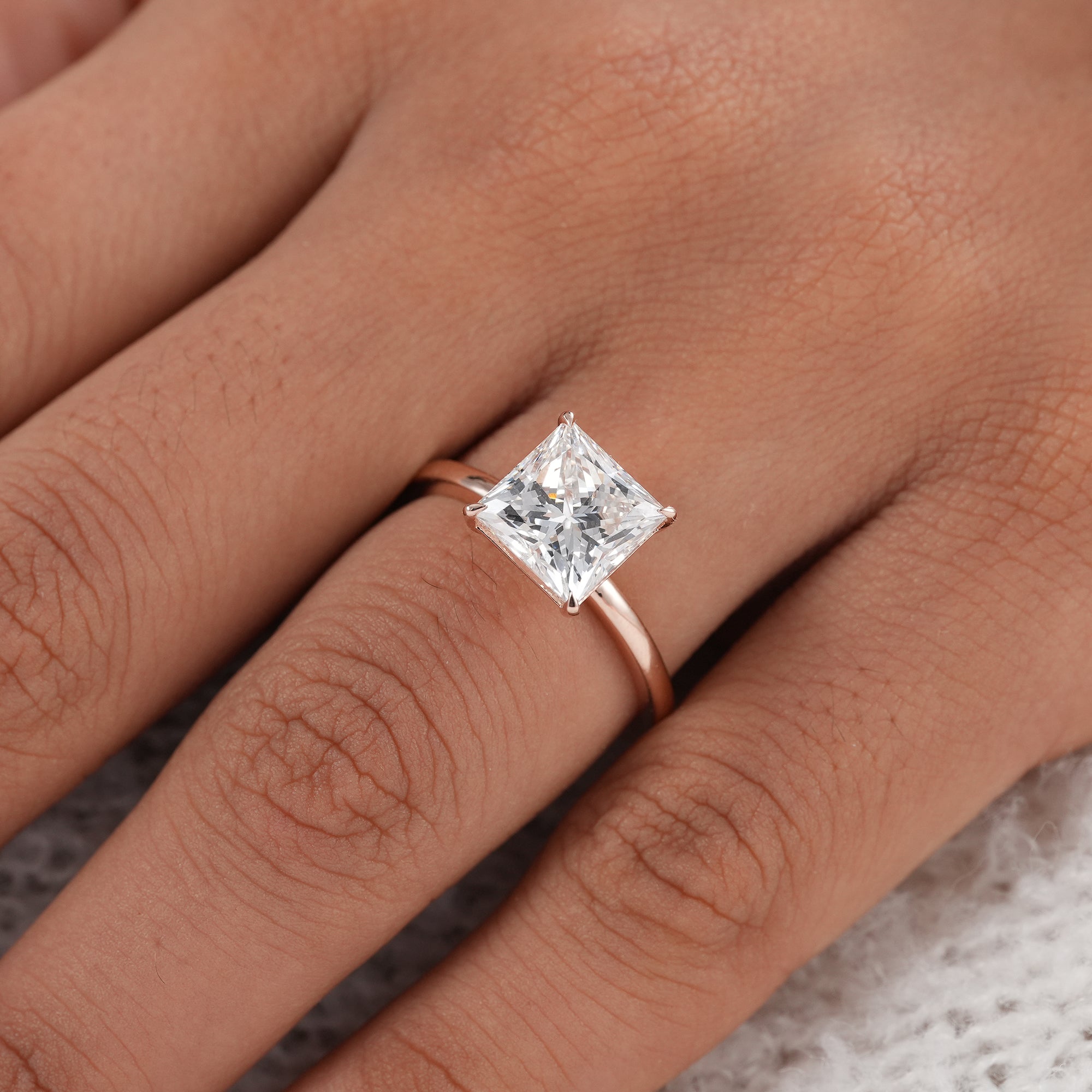 Sustainable princess cut diamond engagement ring.