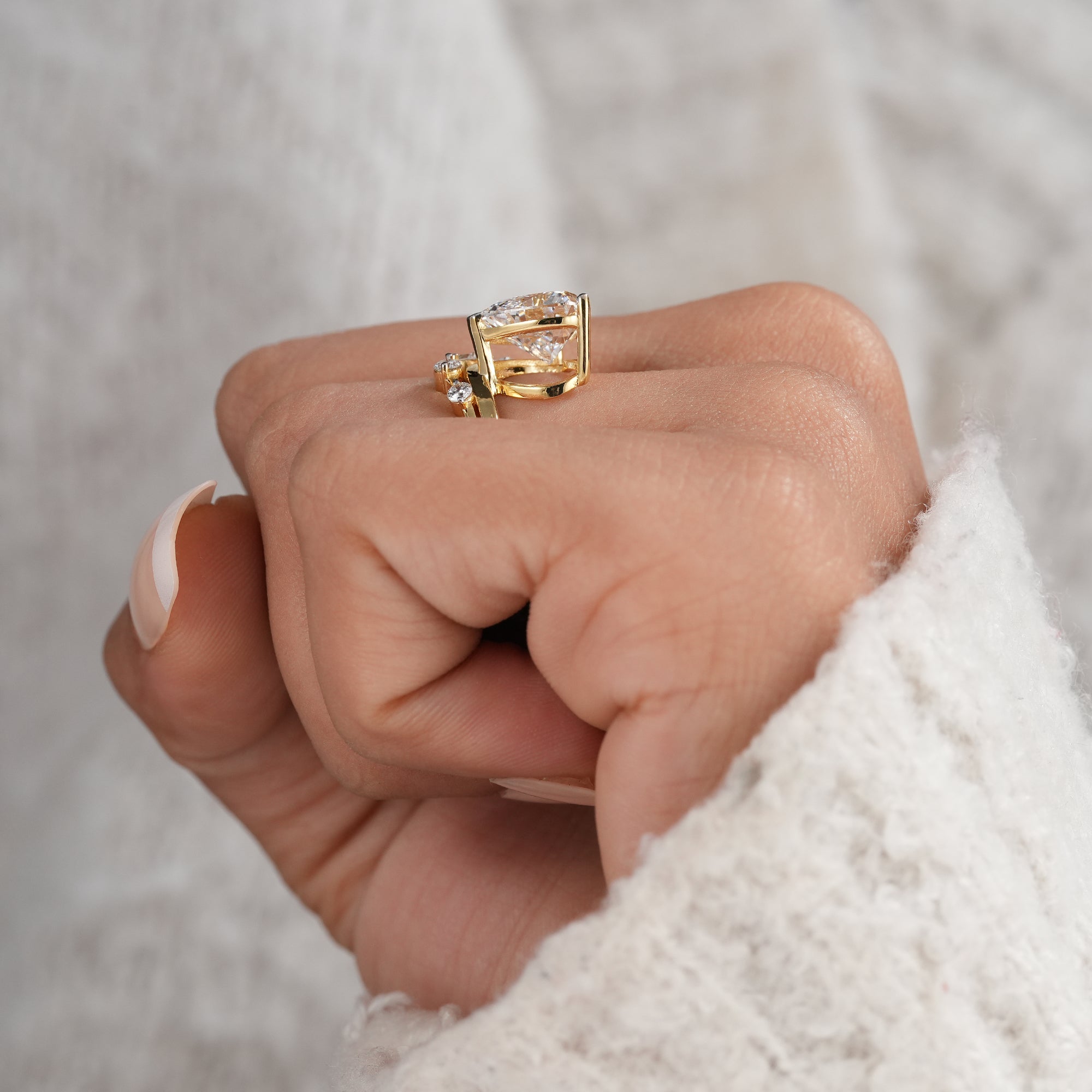 Close up of heart shaped lab grown diamond engagement ring.