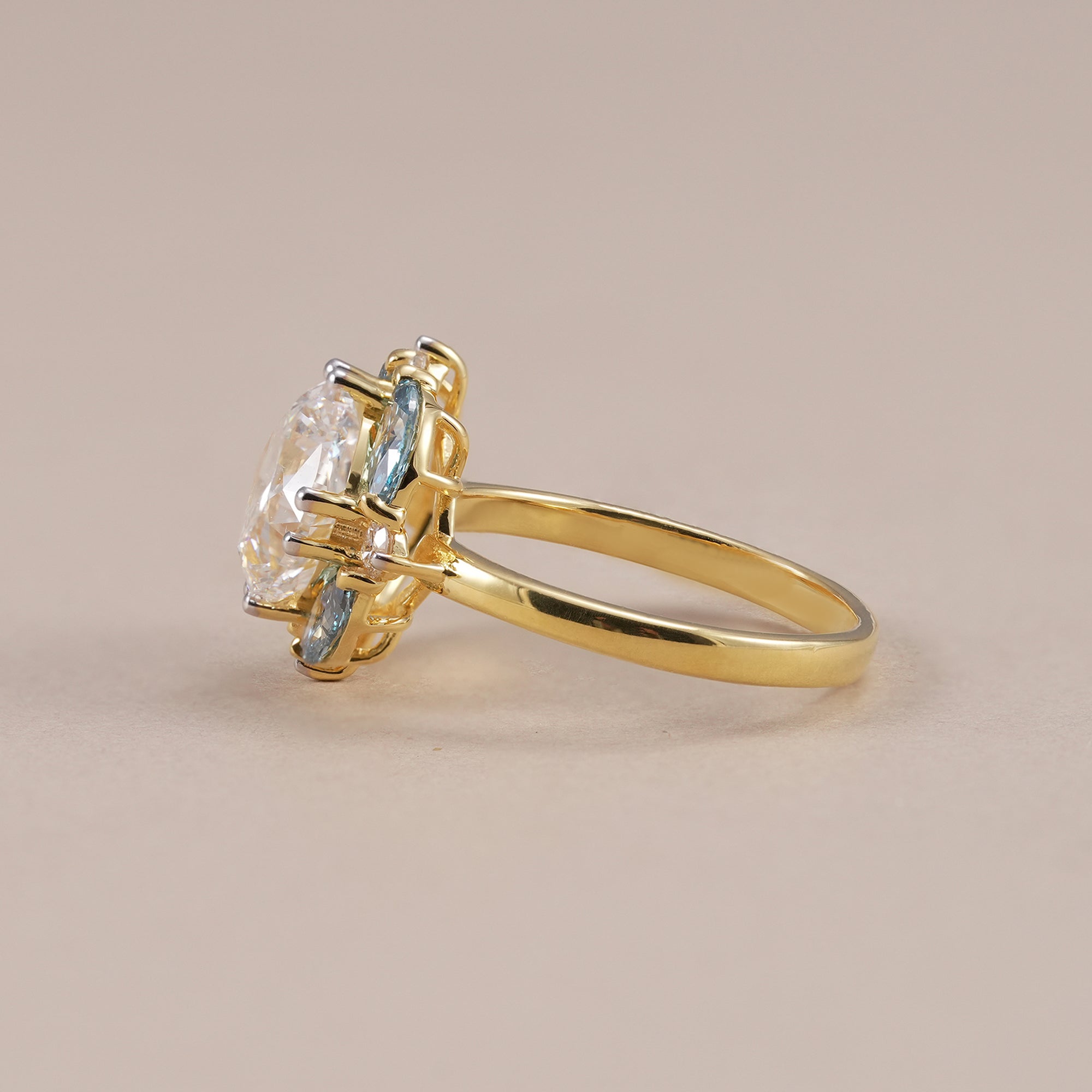 Cushion diamond engagement ring in yellow gold setting