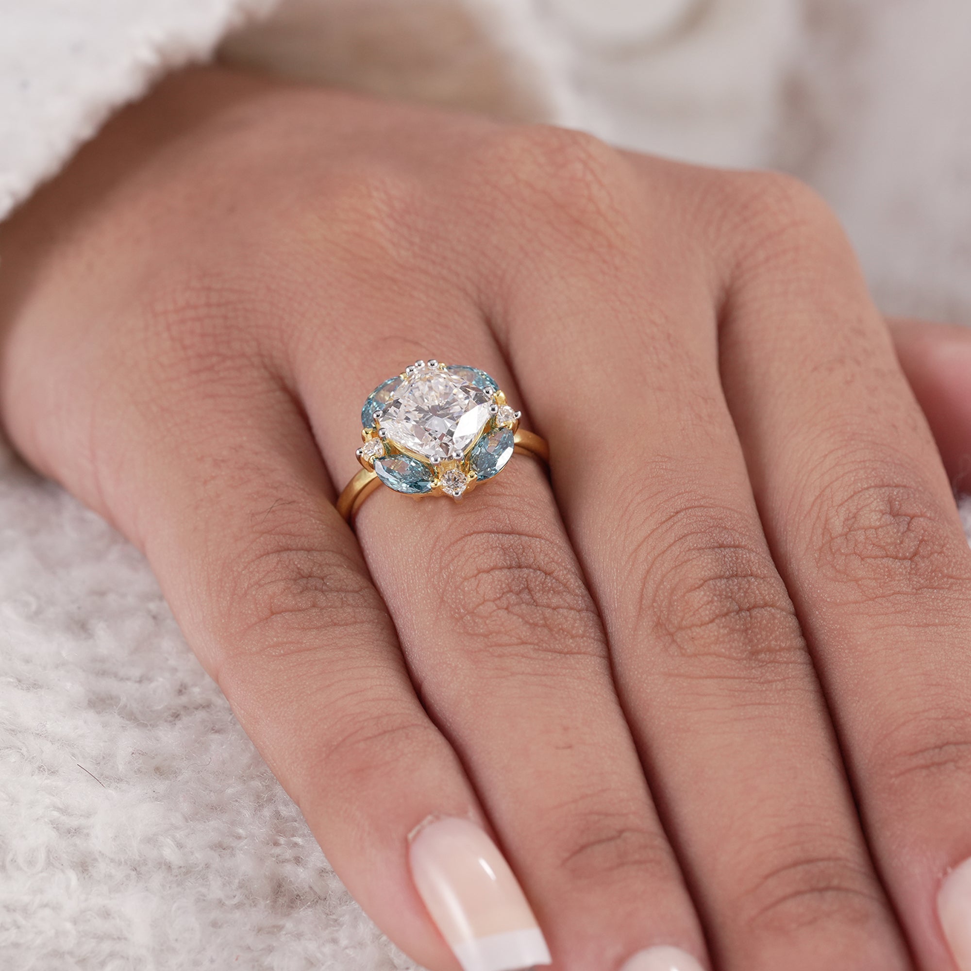 Unique cushion diamond ring with marquise diamond petals