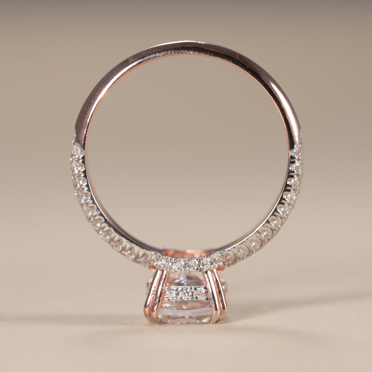 Sustainable lab grown diamond ring featuring a cushion center stone in handcrafted solid gold.