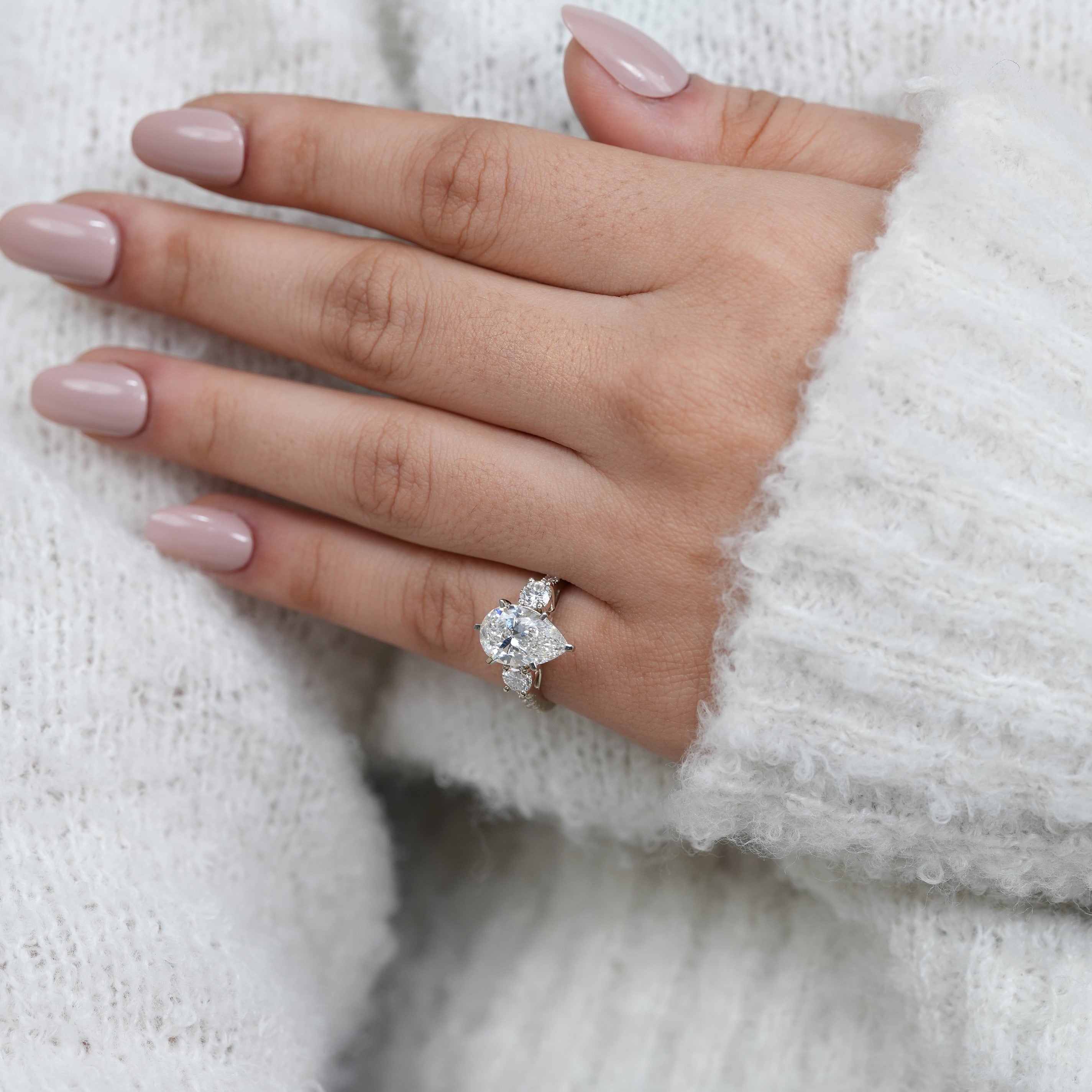 Elegant pear three stone lab grown diamond ring for engagement