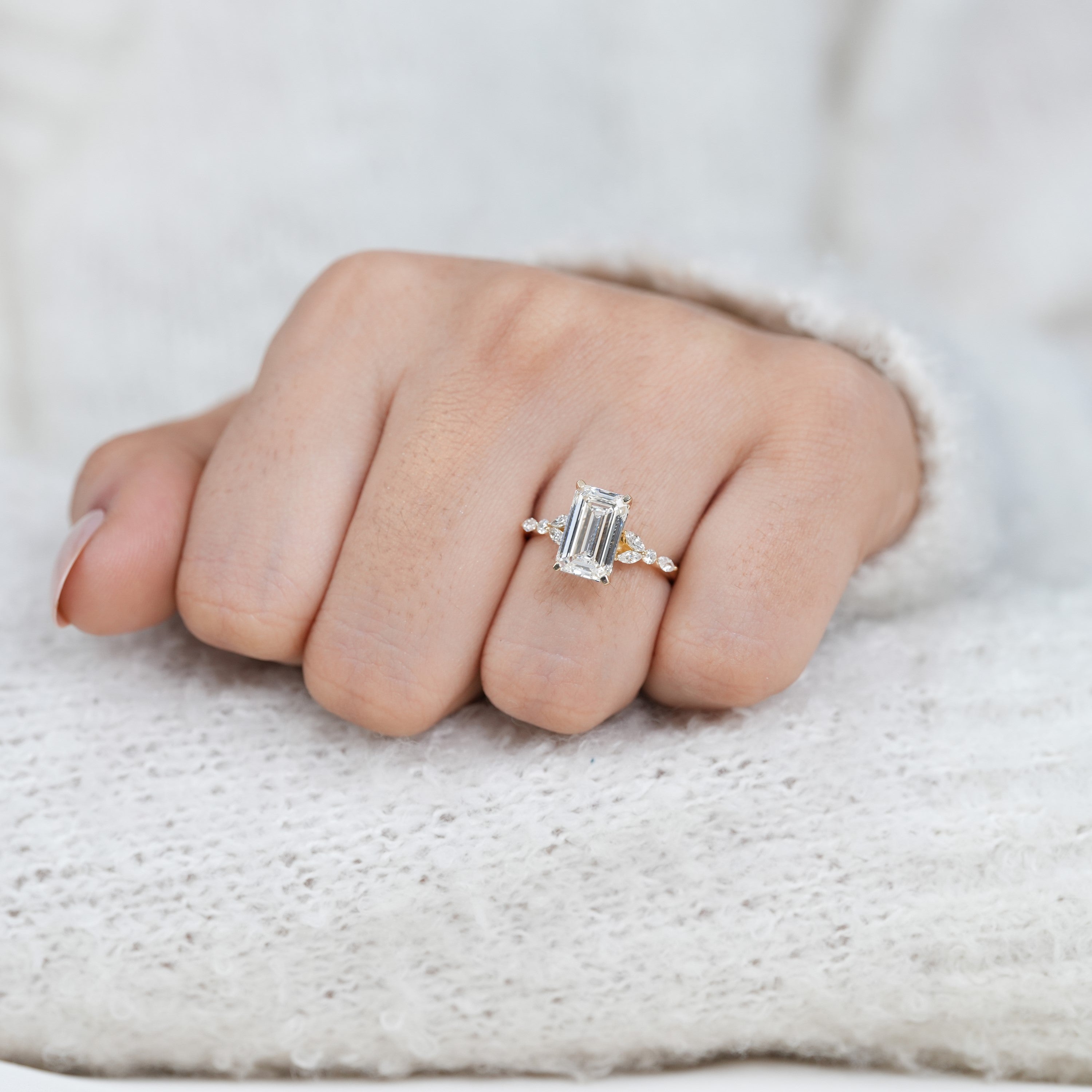Emerald cut lab grown diamond ring with side accents for anniversary