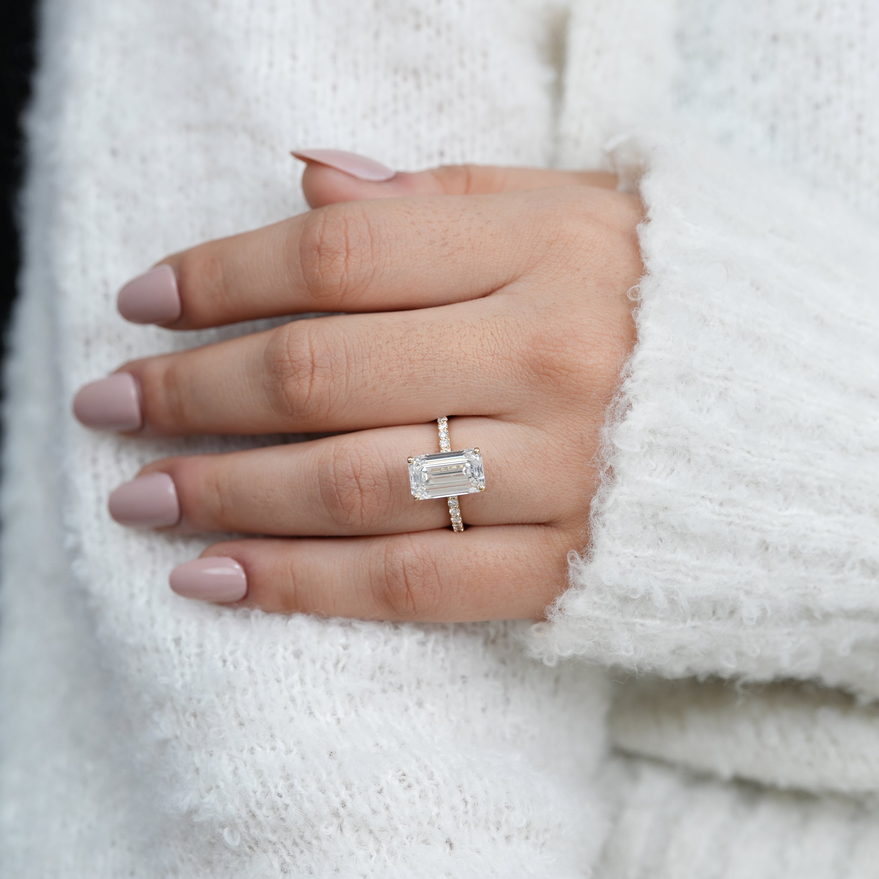 Elegant emerald cut lab grown diamond ring with hidden halo sparkle