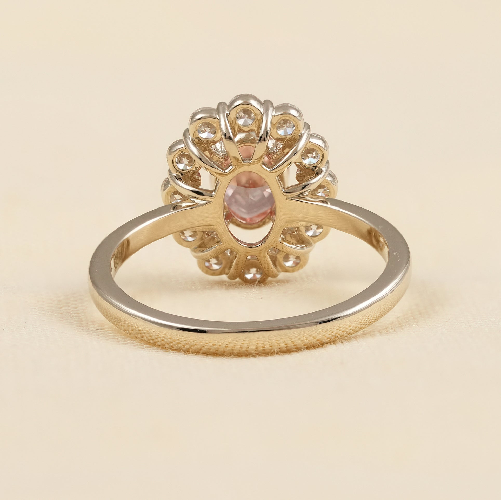 Vintage Style Pink Oval Diamond Ring with Sparkling Halo Setting