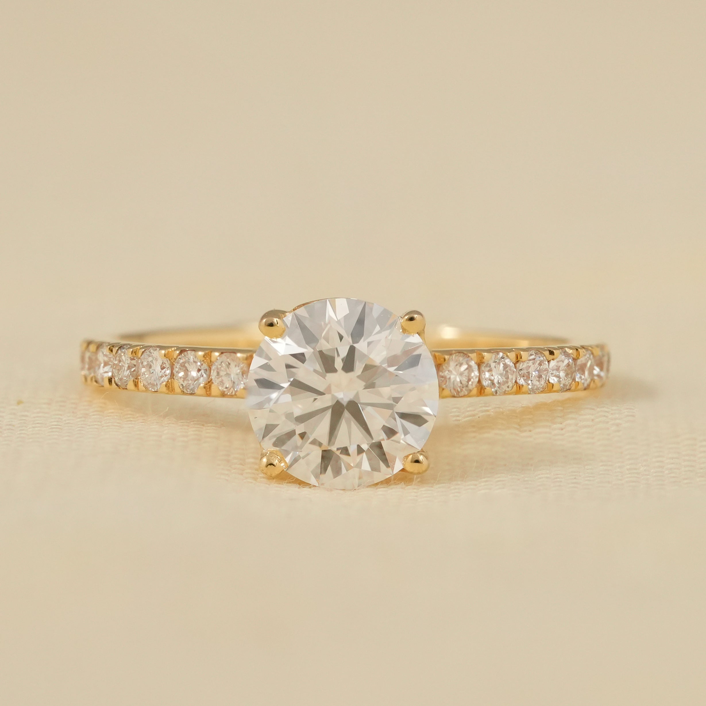 lab grown diamond round cut engagement ring pavé band