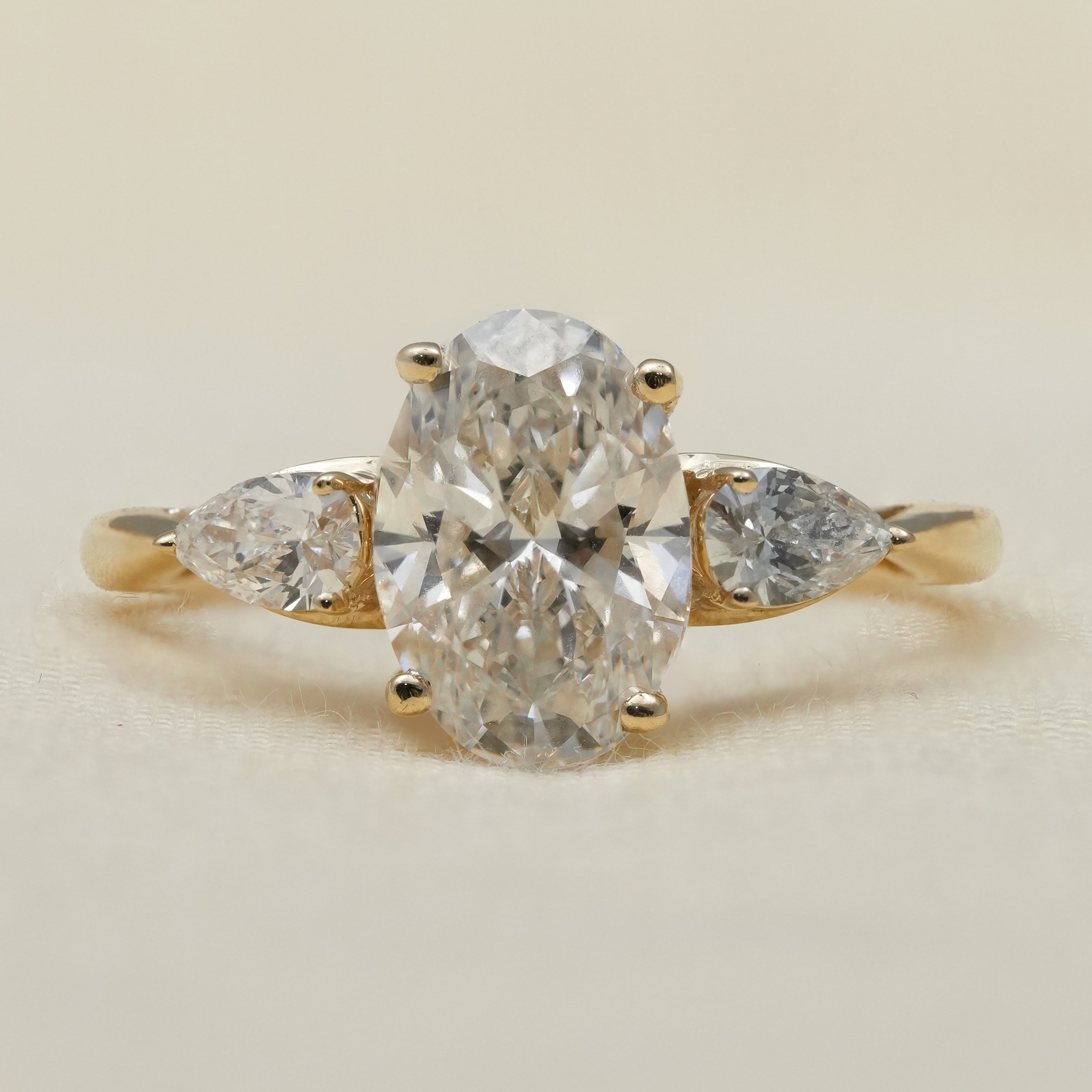 Three Stone Oval Cut Lab Diamond Engagement Ring