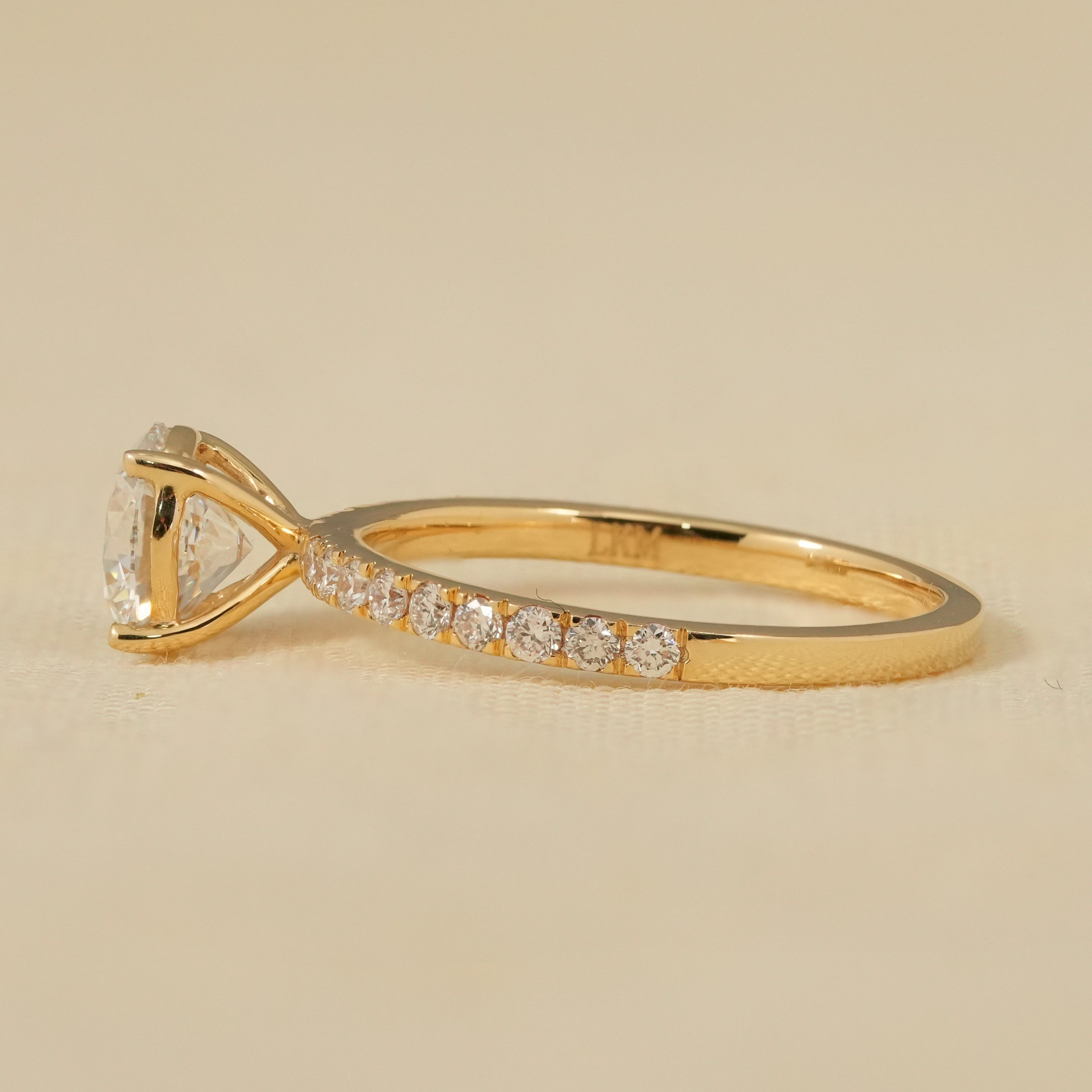 Timeless lab grown diamond engagement ring with round cut center stone