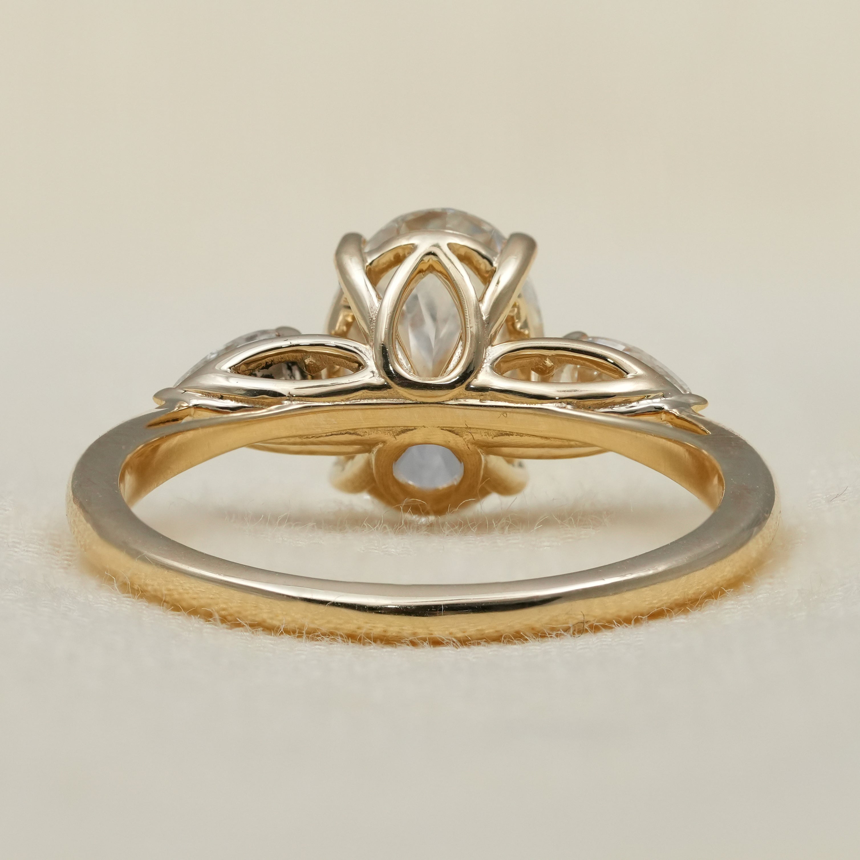 Oval lab grown diamond ring with pear sides for proposal