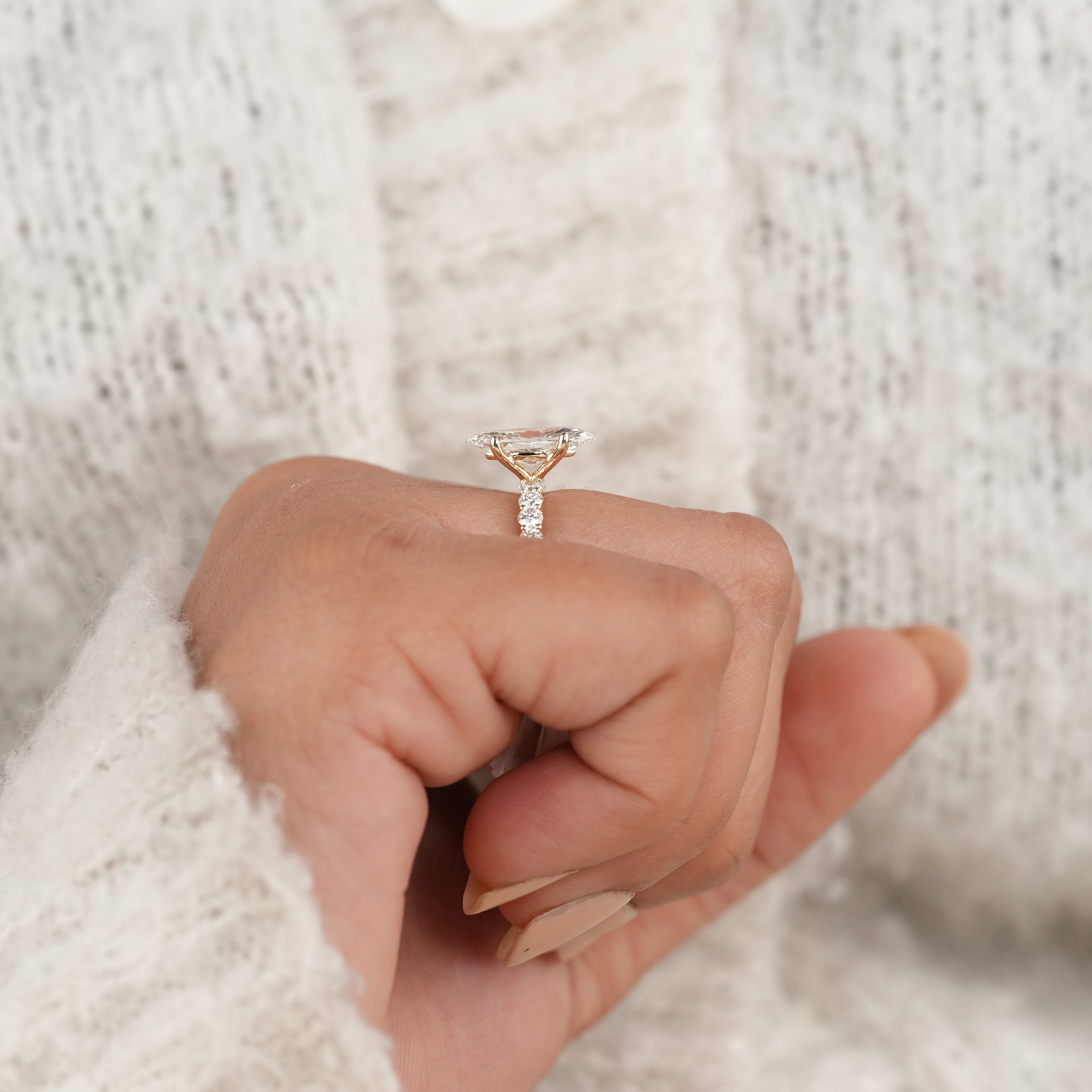 Marquise Solitaire Engagement Ring with Sparkling Diamond Shank