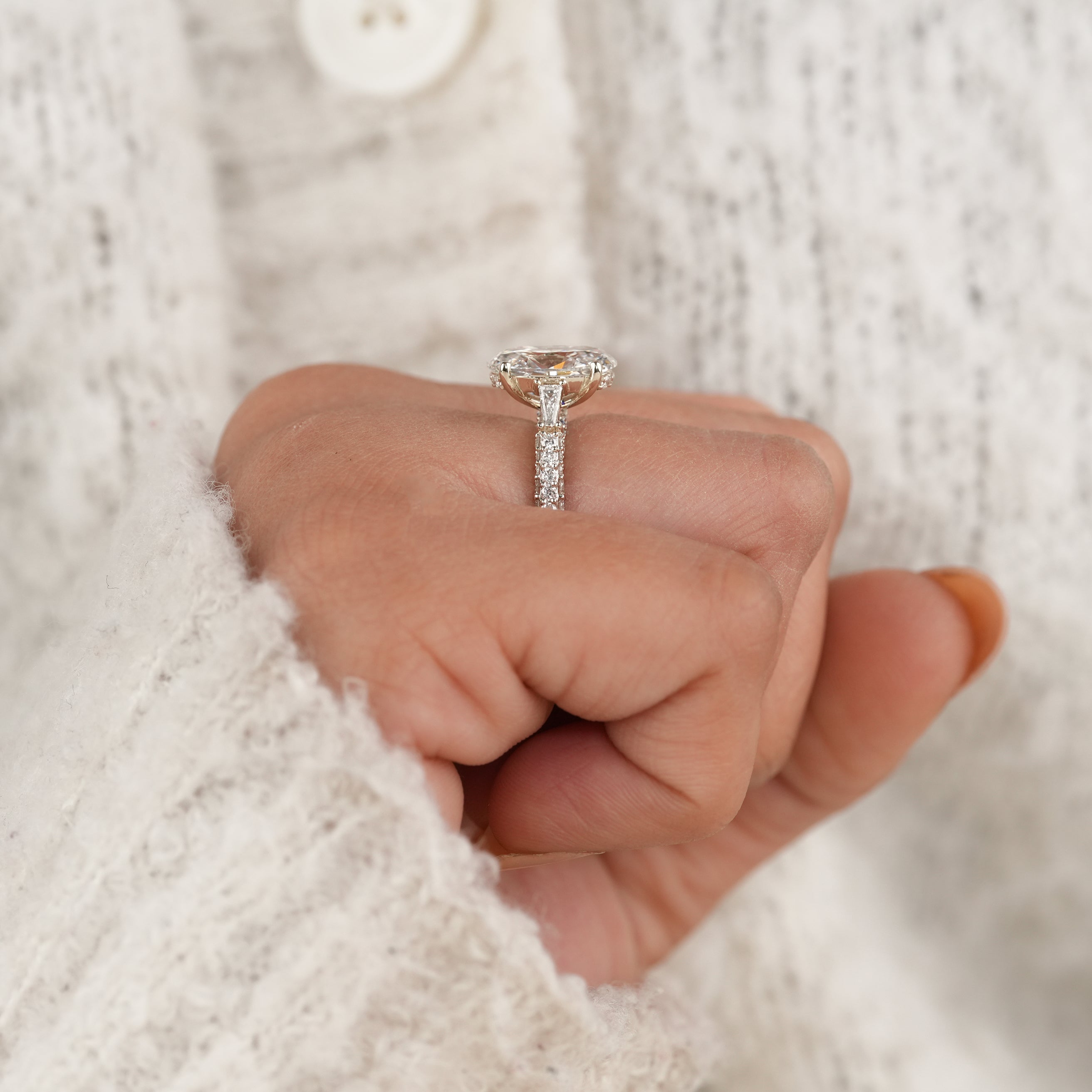 Timeless Oval Diamond Engagement Ring with Baguette and Pave Design