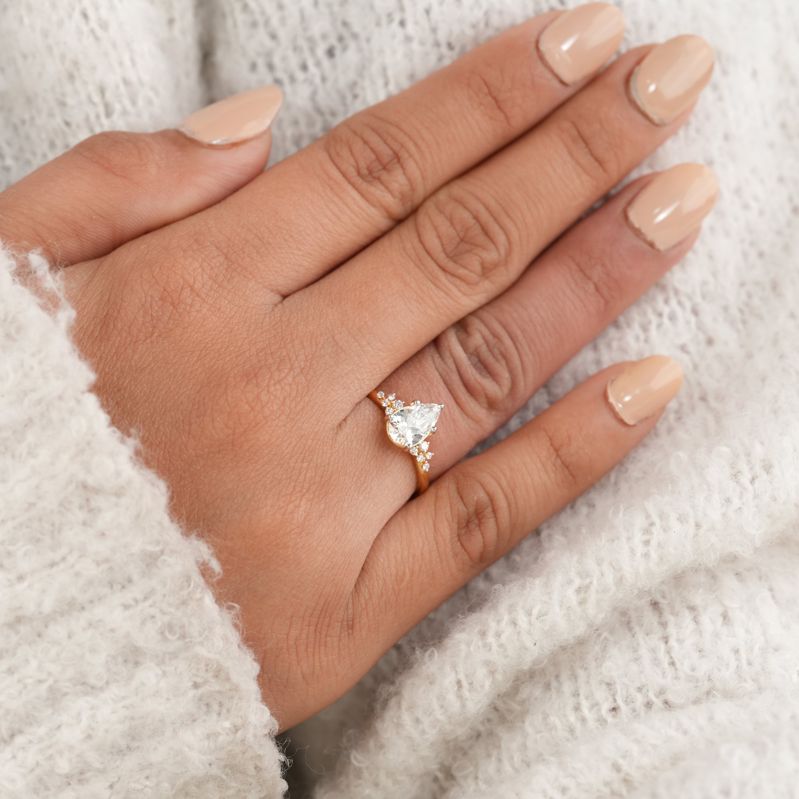 Unique Pear Shaped Engagement Ring with Floral Diamond Side Stones