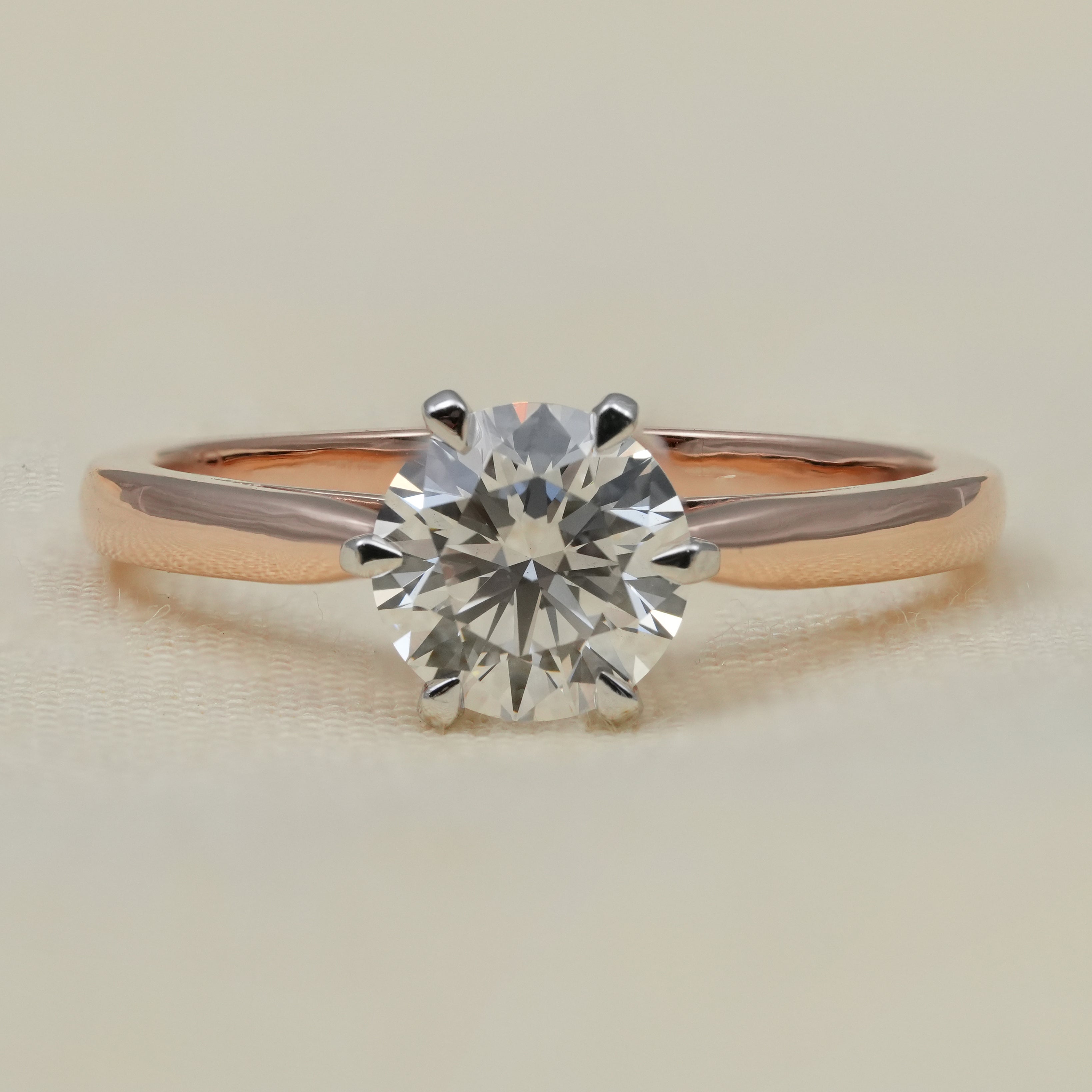 Round cut solitaire ring featuring a lab grown diamond for engagements