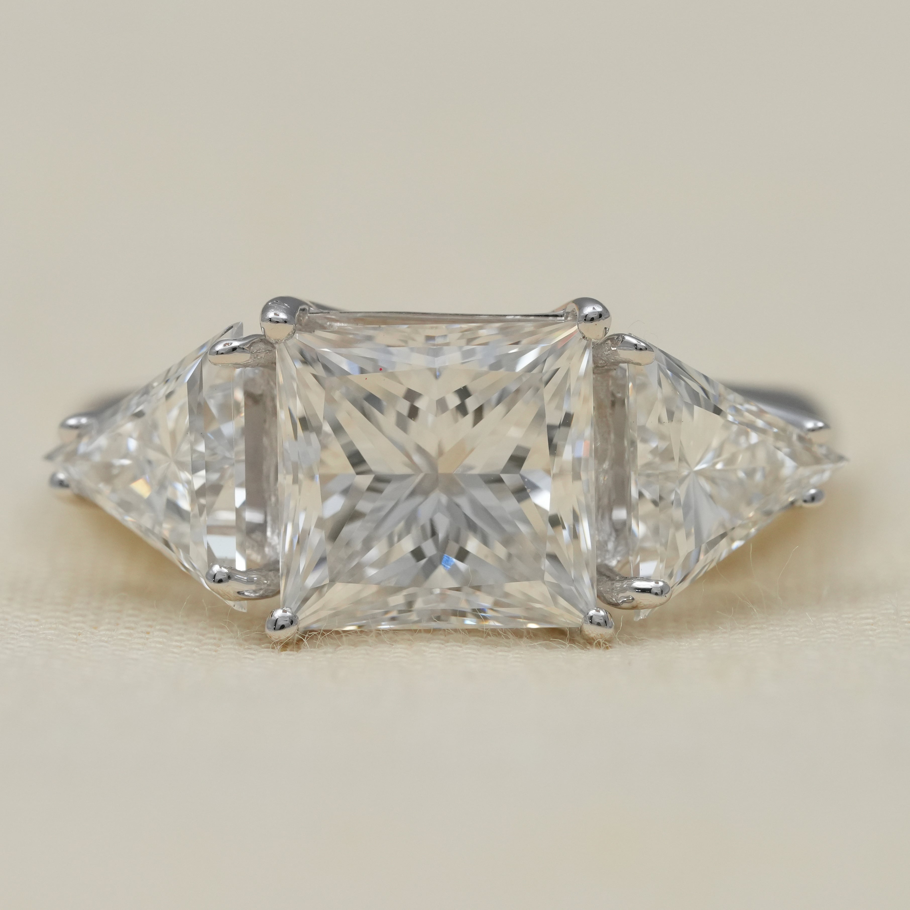 Princess cut lab grown diamond three stone ring for wedding occasions