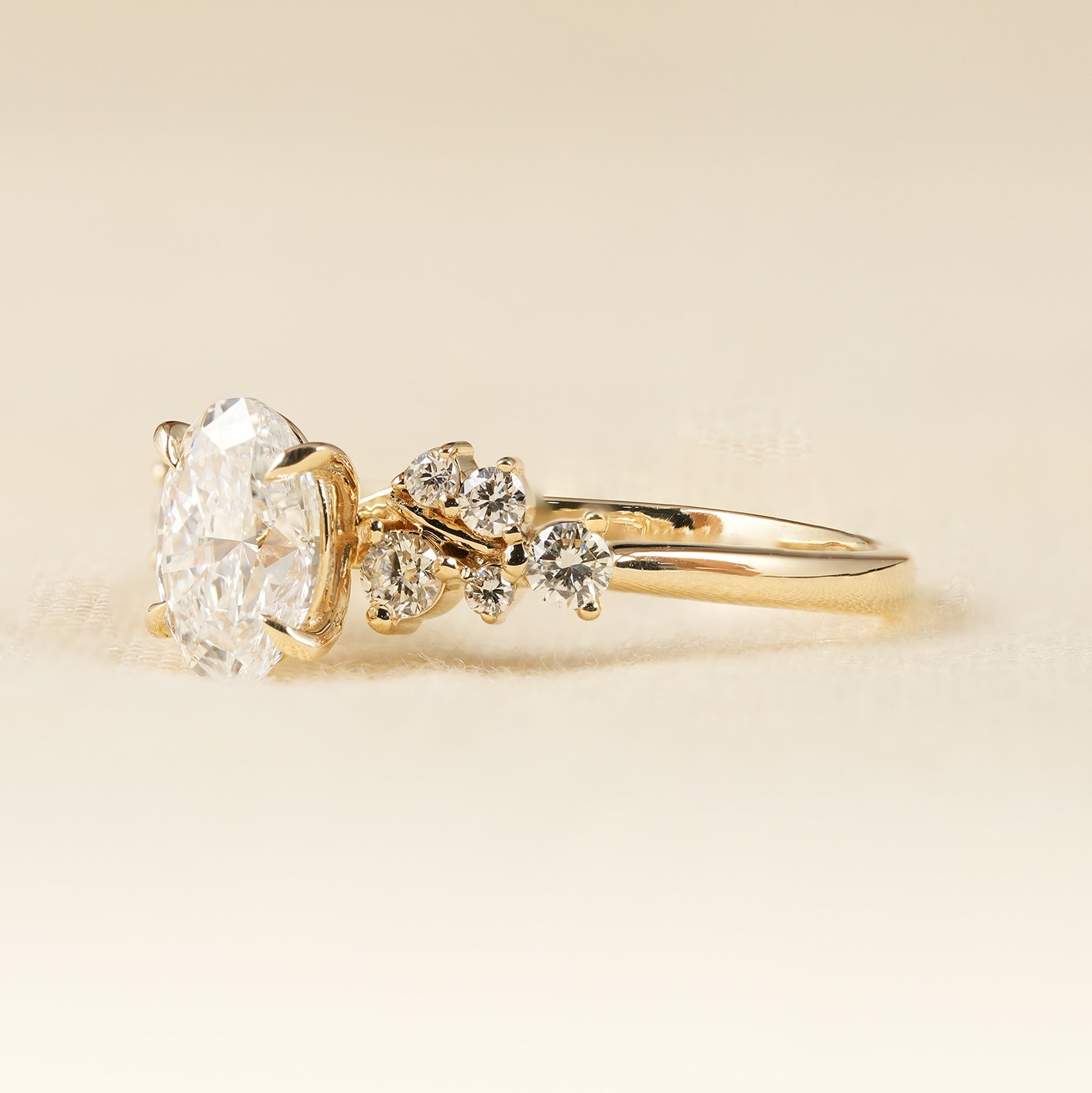 Vintage Inspired Oval Diamond Engagement Ring with Cluster Accents