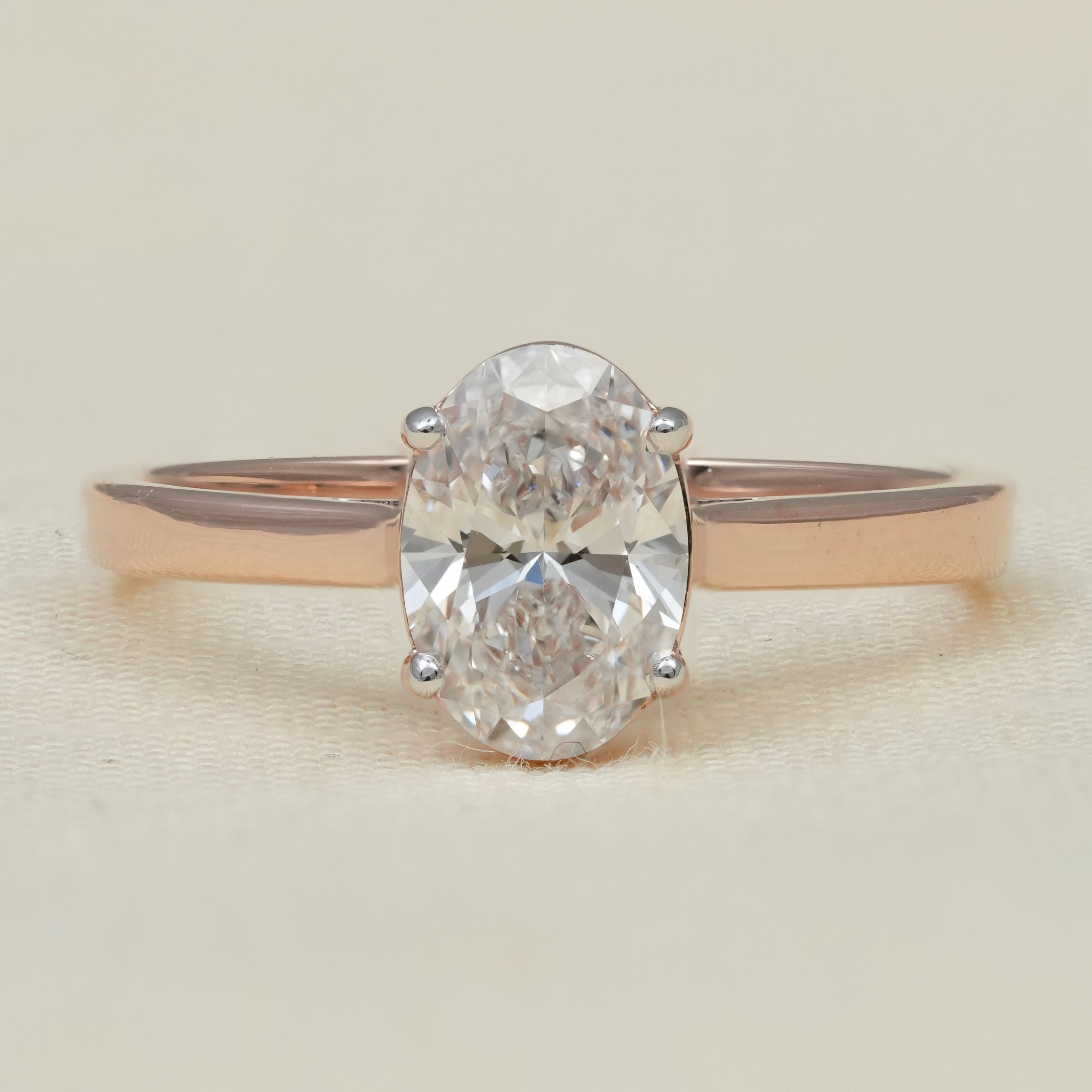 Elegant oval cut solitaire ring featuring a brilliant lab grown diamond