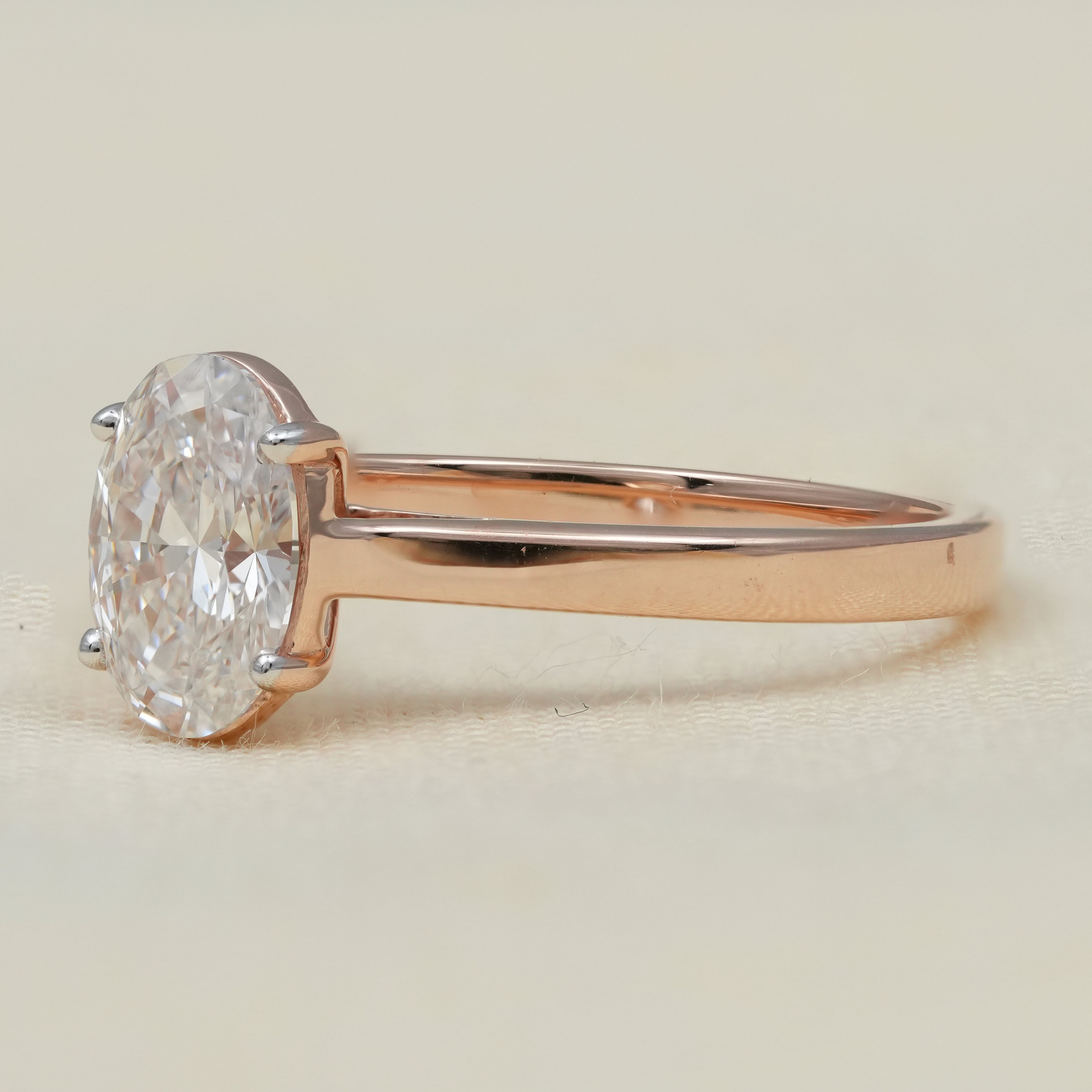 Classic oval solitaire engagement ring designed with lab grown diamond