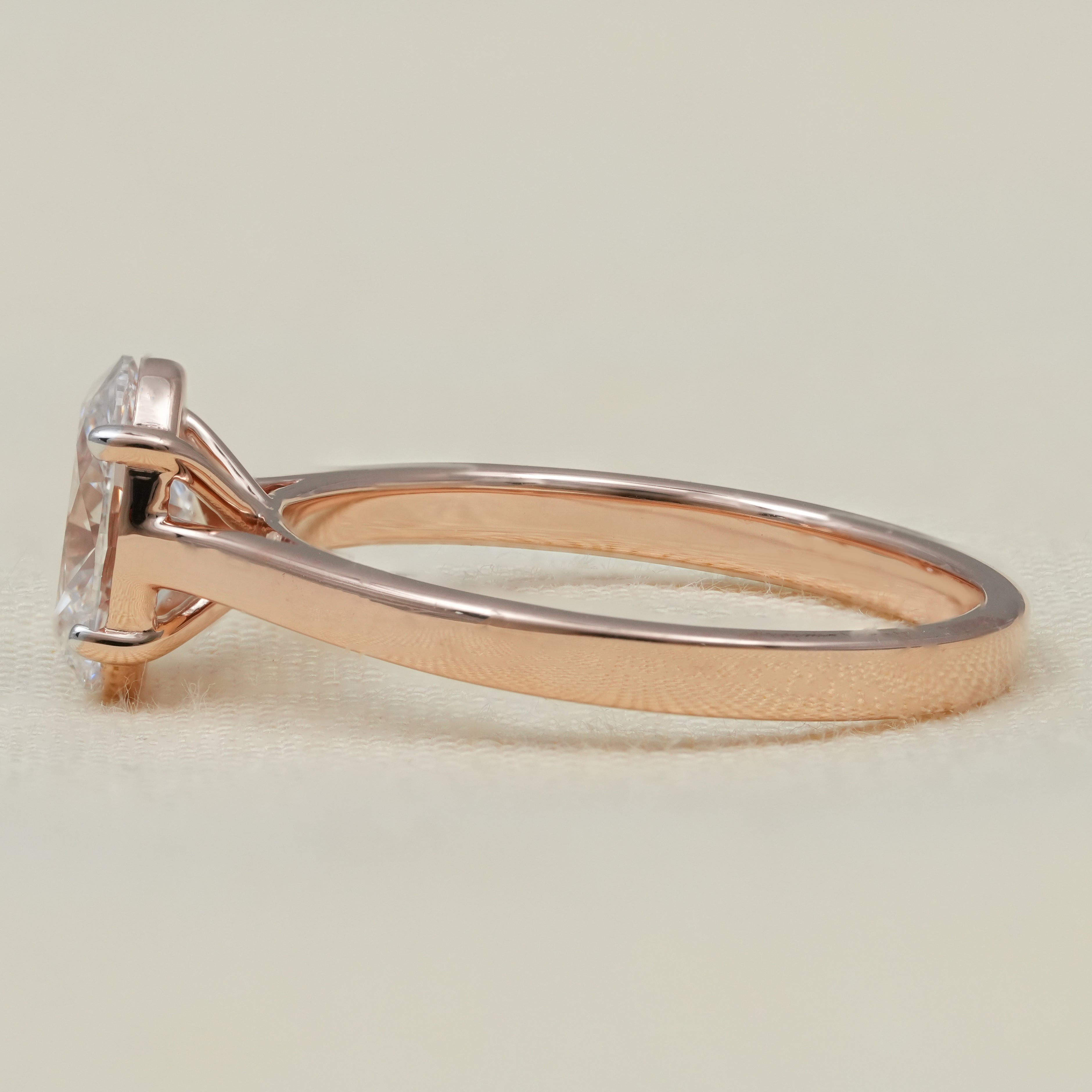 Minimal oval cut ring showcasing a sparkling lab grown diamond