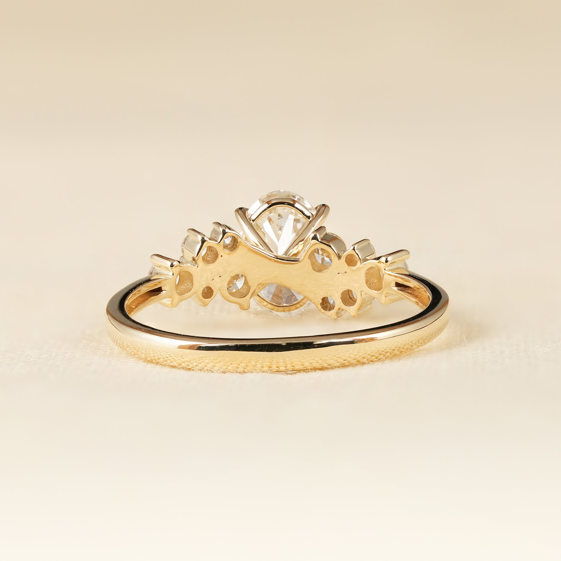 Nature Inspired Oval Engagement Ring with Round Diamond Clusters