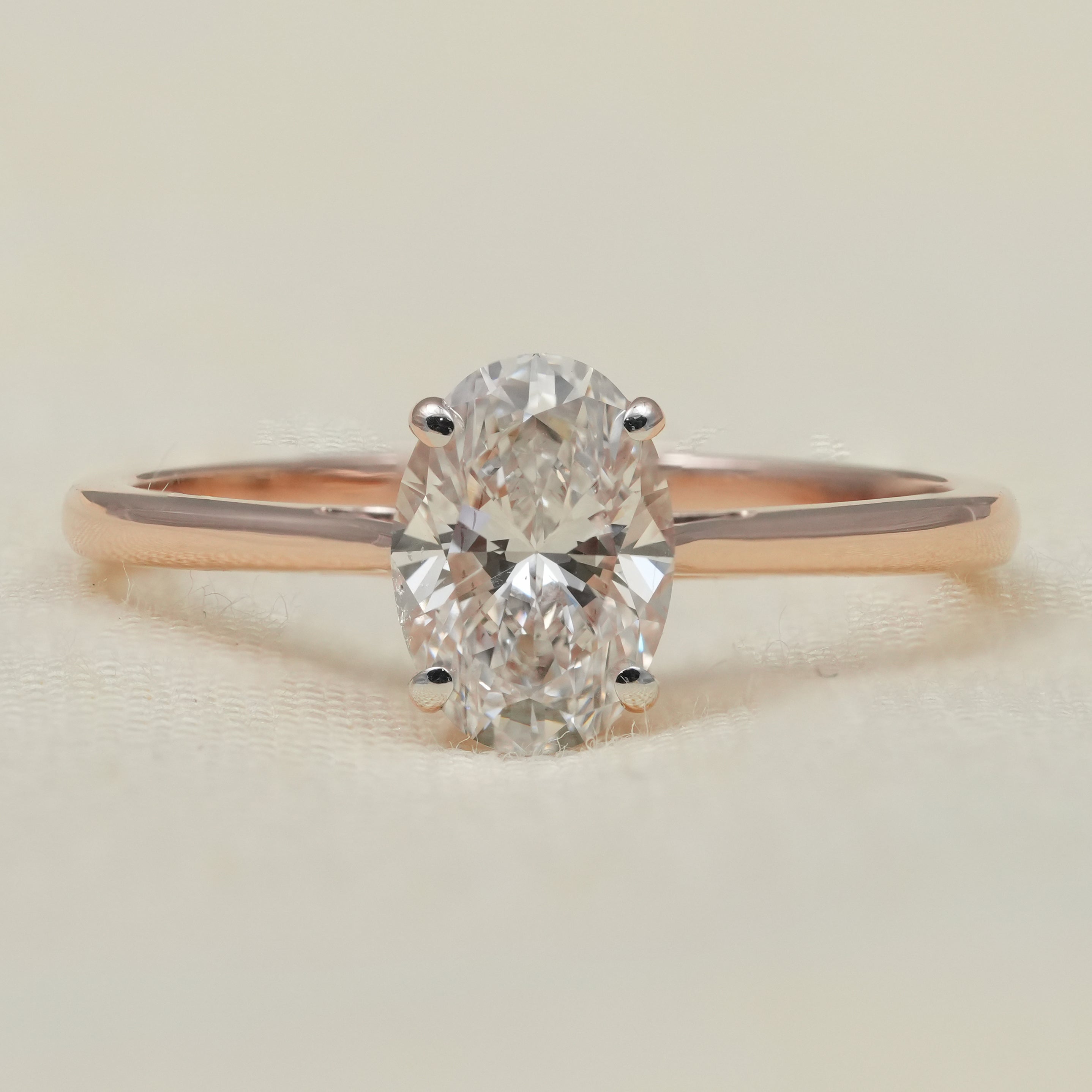 Oval cut solitaire ring featuring a lab grown diamond for engagements