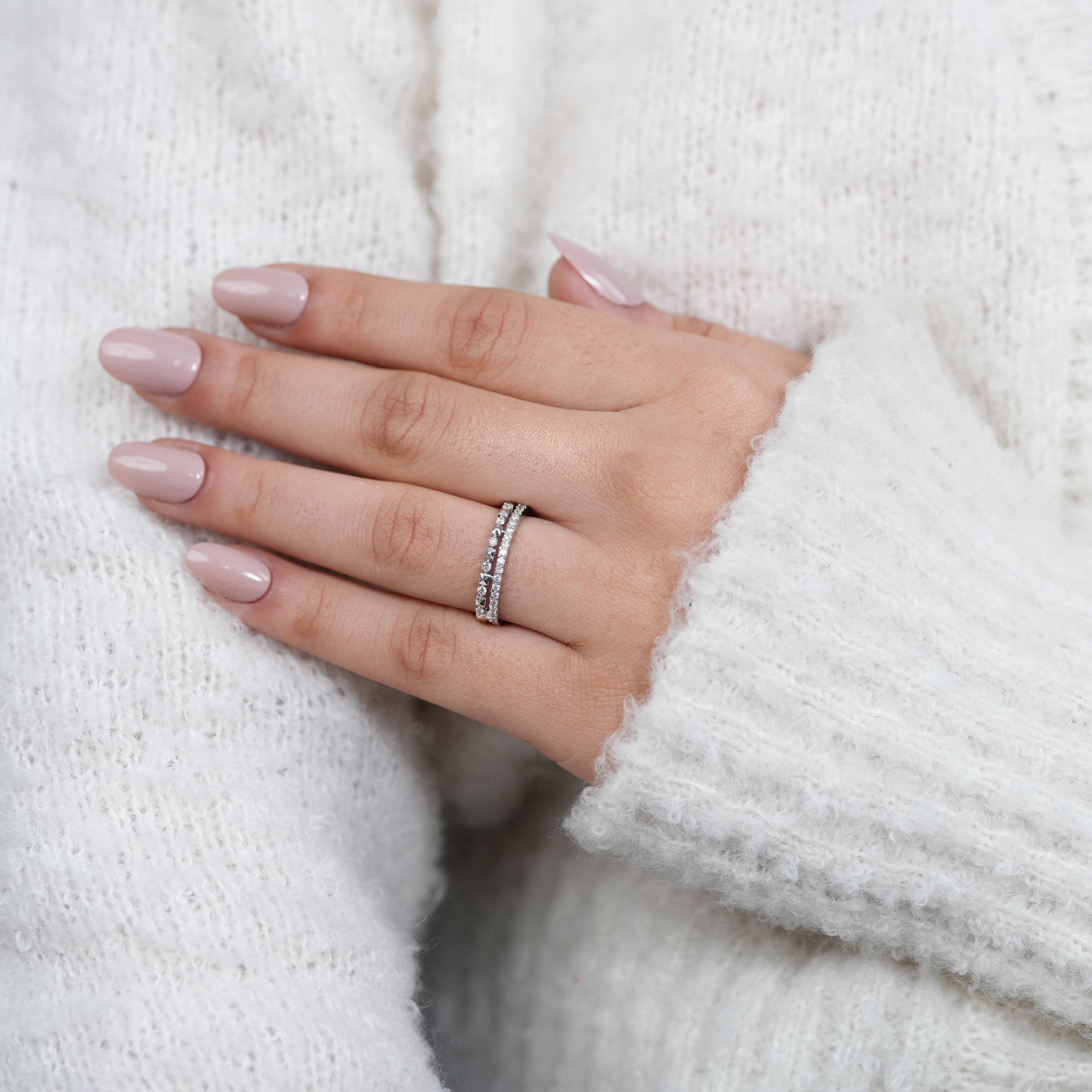 White gold diamond band with polished geometric accents