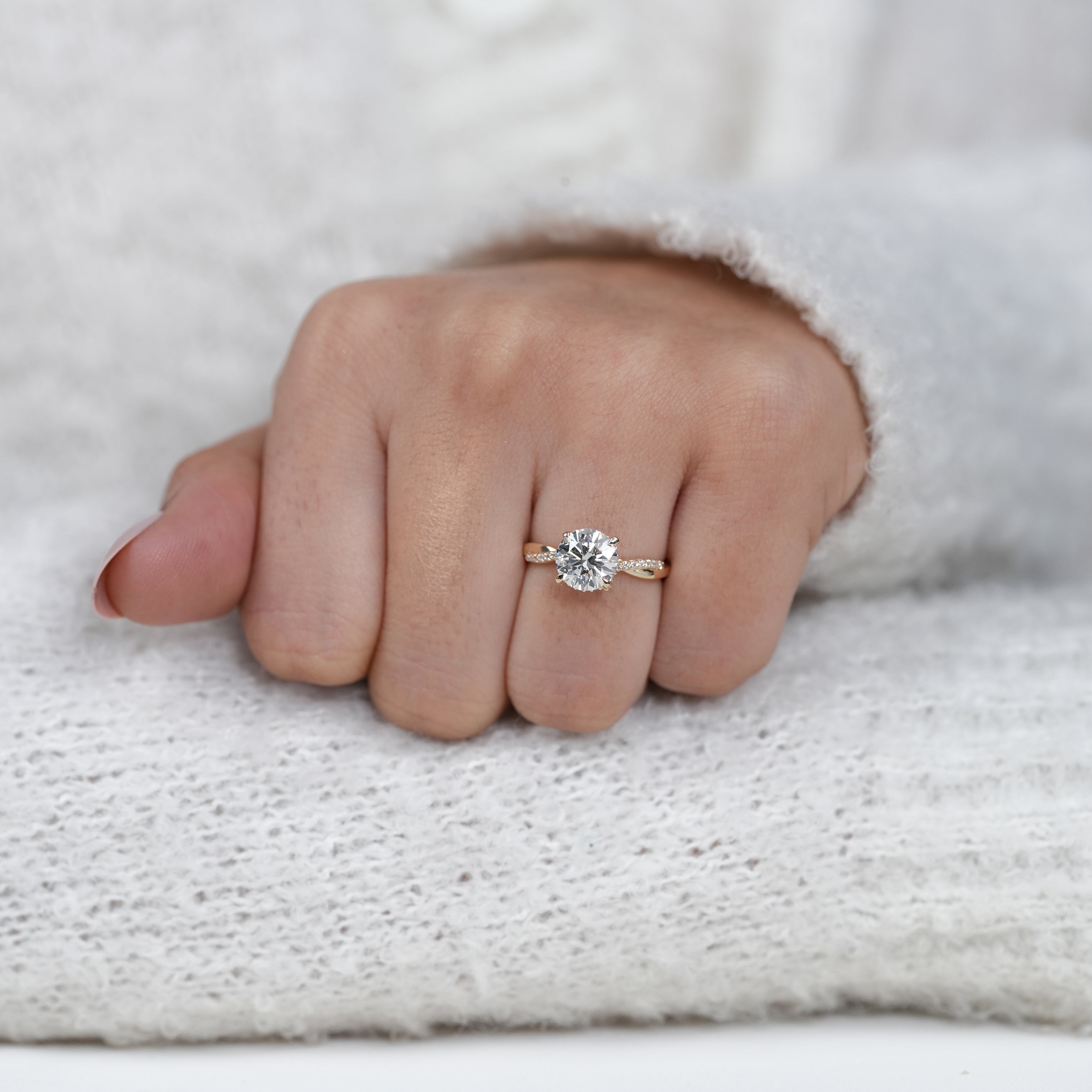 Round lab grown diamond bridal ring with twisted band detail
